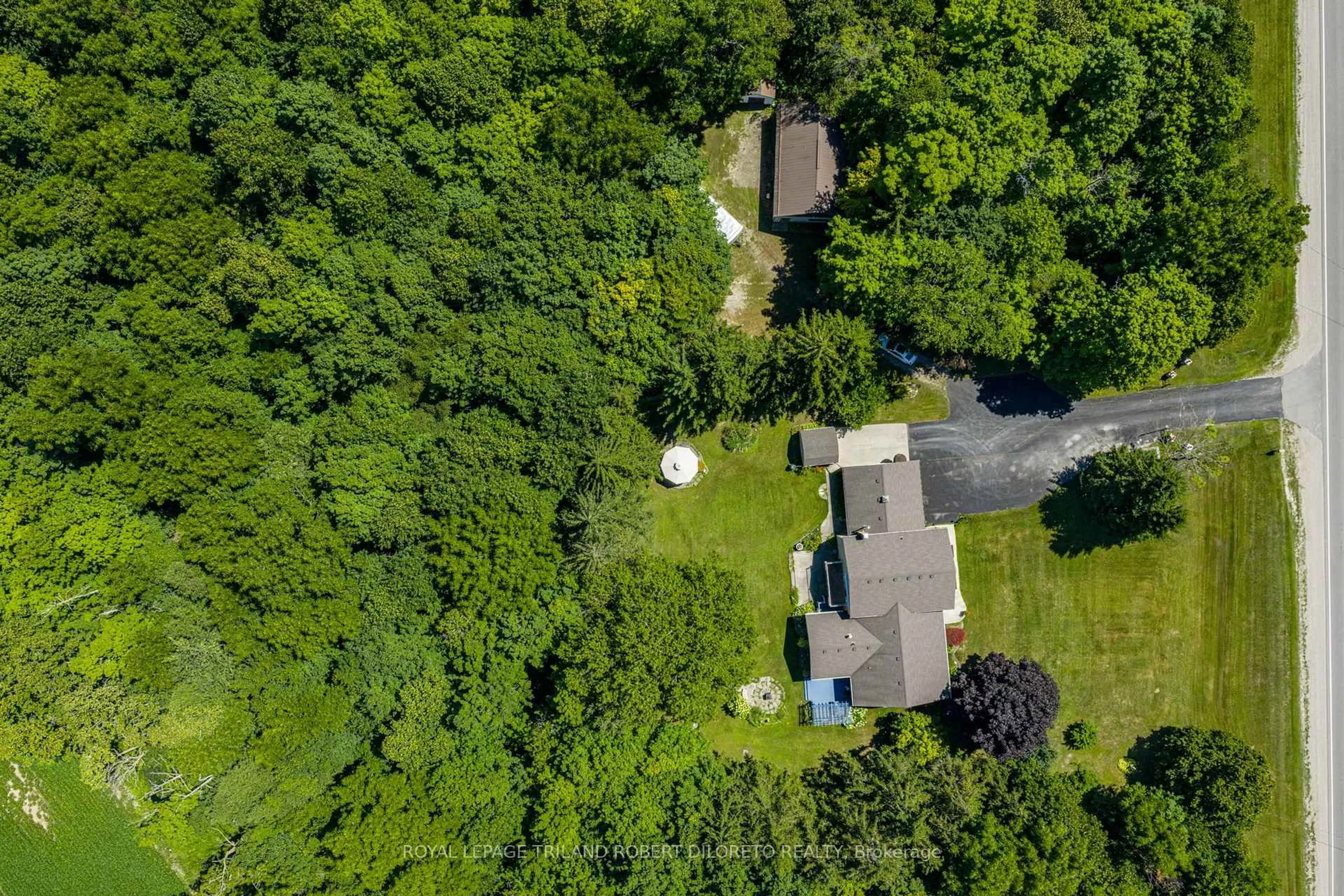 A pic from outside/outdoor area/front of a property/back of a property/a pic from drone, forest/trees view for 6186 EGREMONT Dr, Middlesex Centre Ontario N0L 1R0