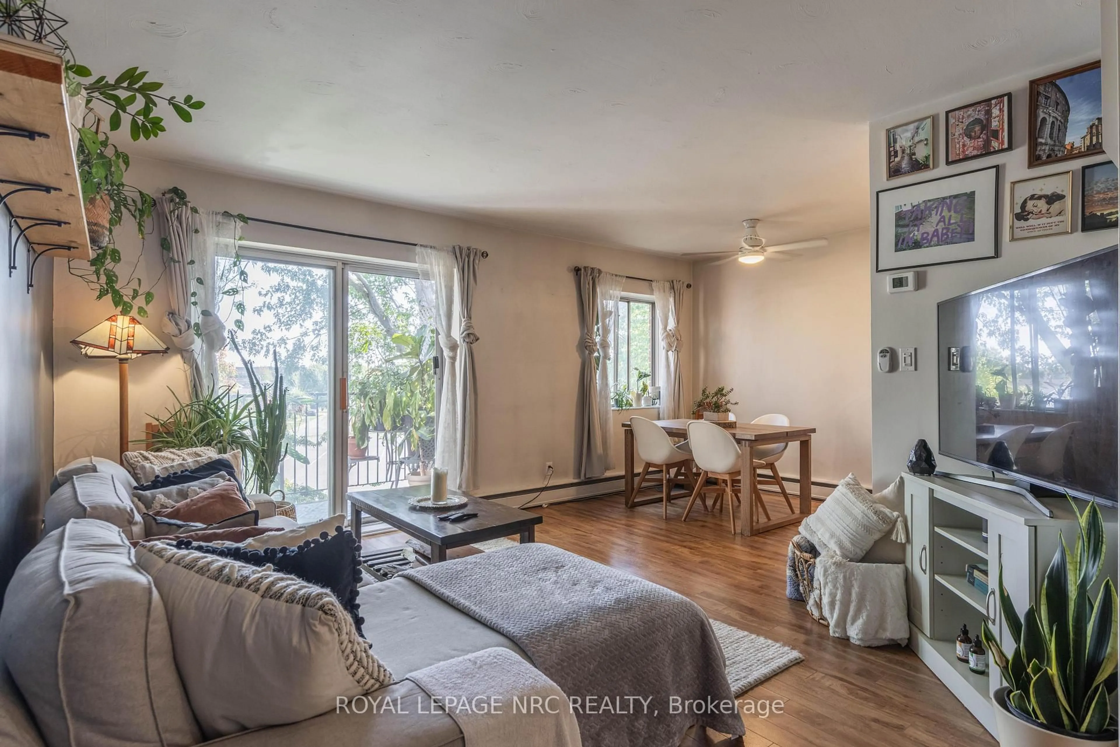 Living room with furniture, unknown for 456 Carlton St #34, St. Catharines Ontario L2M 4X1