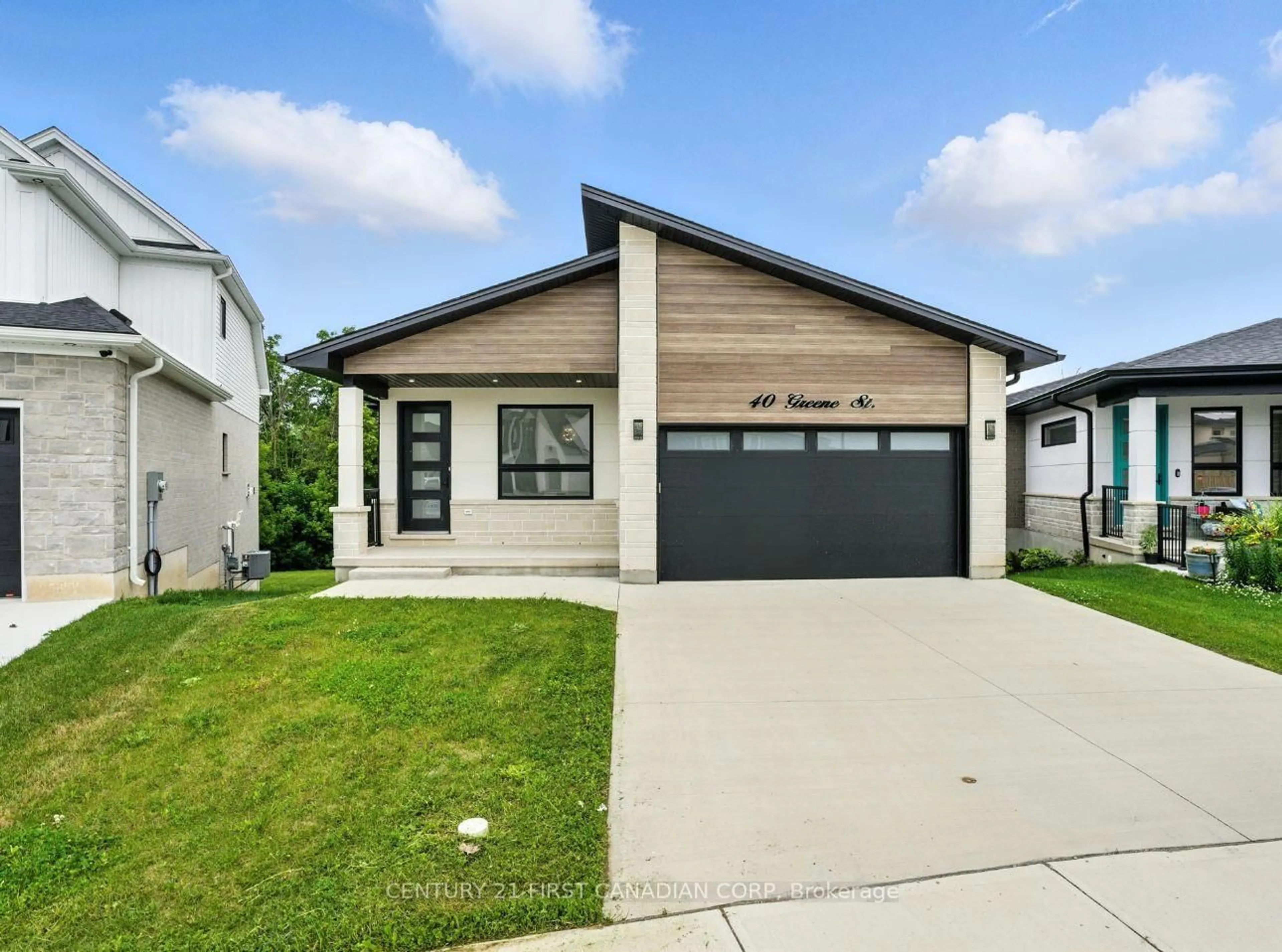 Home with vinyl exterior material, street for 40 Greene St, South Huron Ontario N0M 1S2