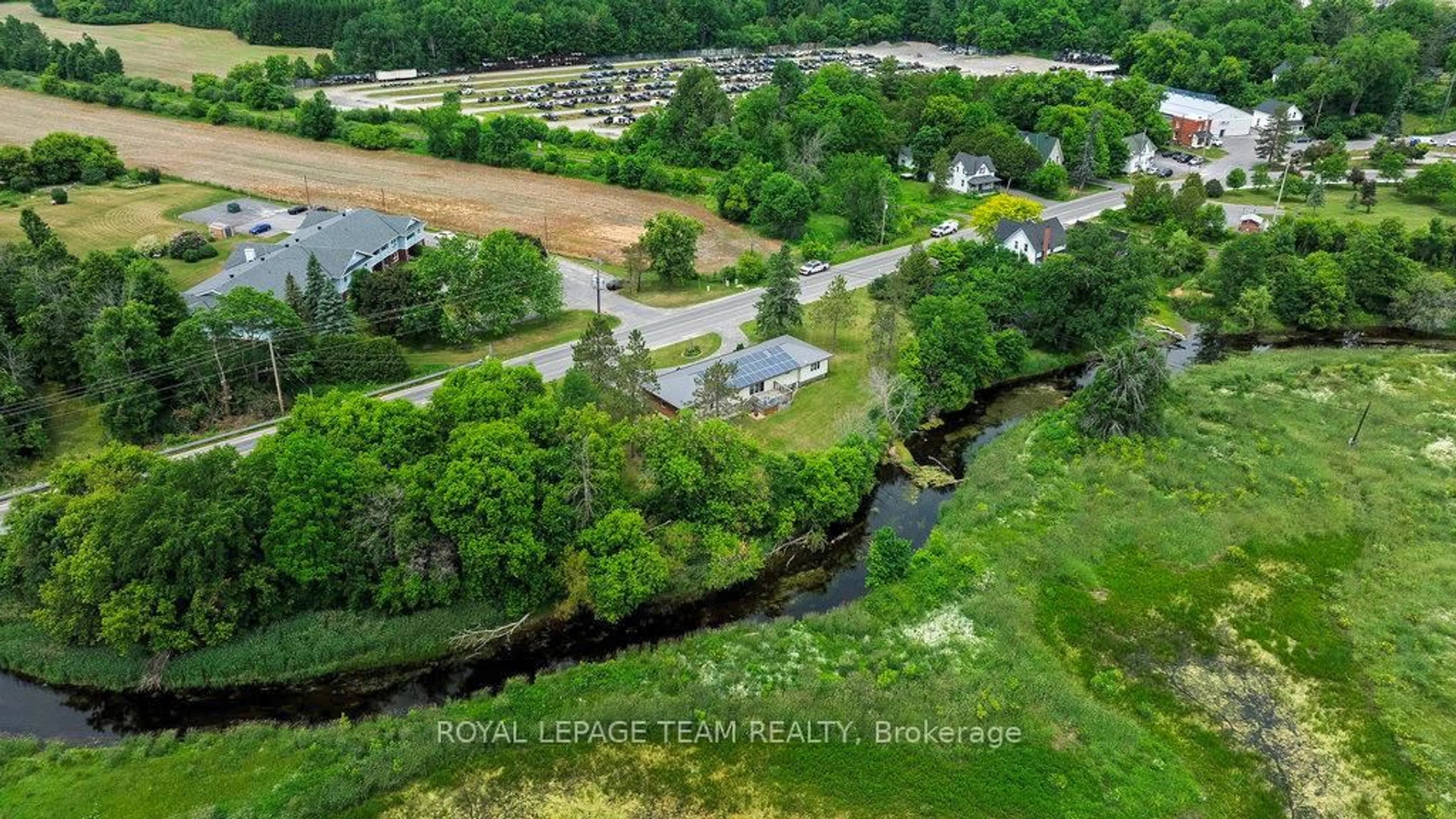A pic from outside/outdoor area/front of a property/back of a property/a pic from drone, water/lake/river/ocean view for 517 Donald B. Munro Dr, Carp Ontario K0A 1L0