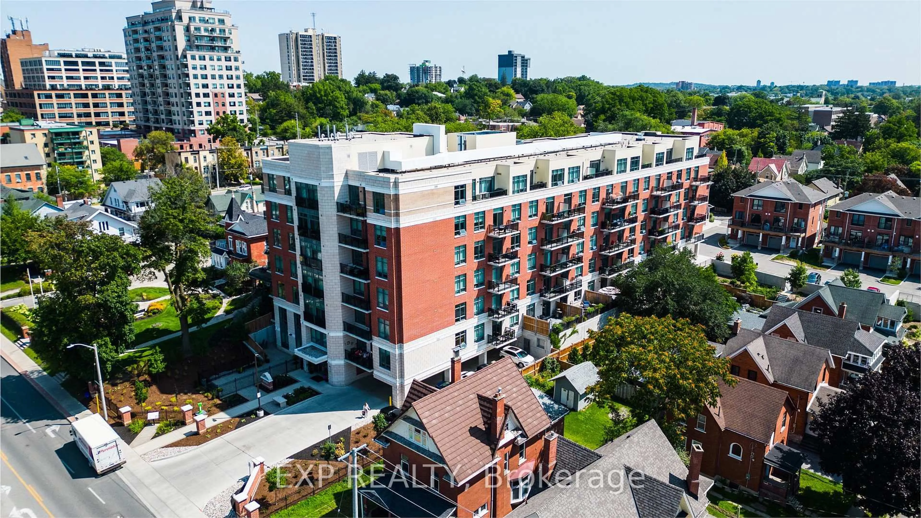 A pic from outside/outdoor area/front of a property/back of a property/a pic from drone, city buildings view from balcony for 399 Queen St #417, Kitchener Ontario N2G 0C4