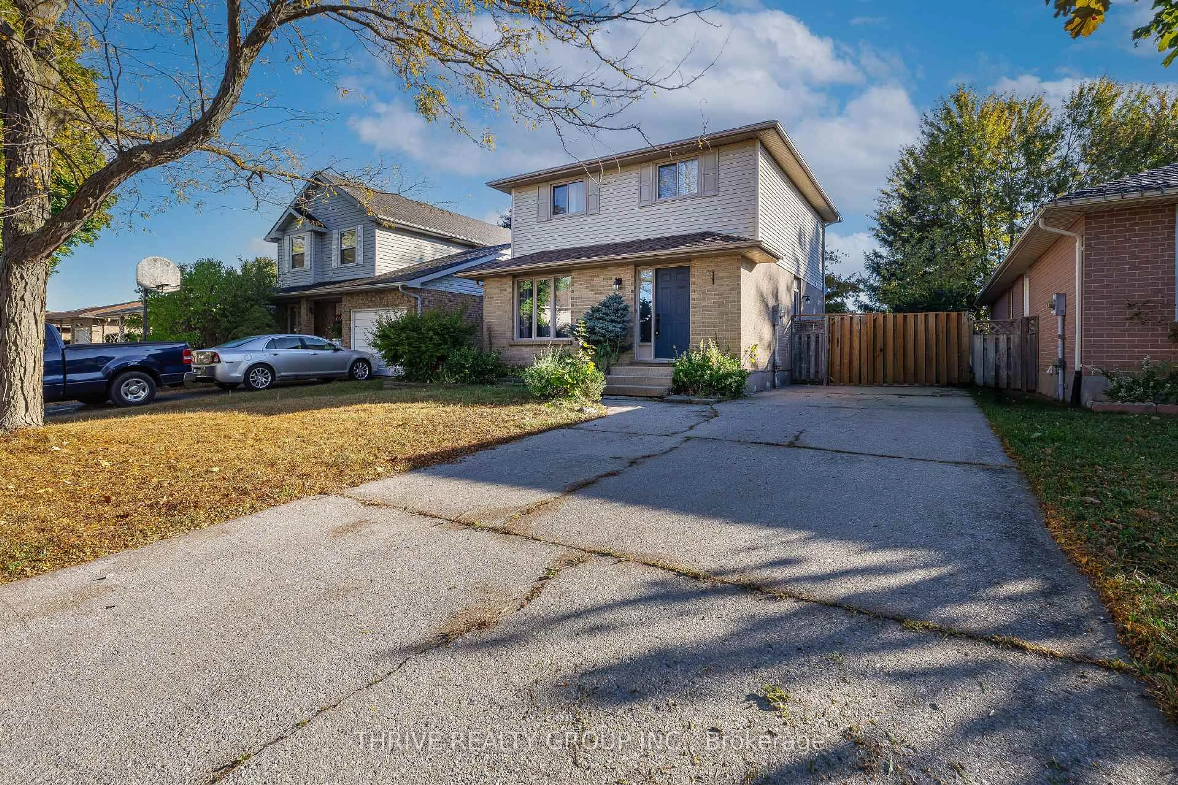 A pic from outside/outdoor area/front of a property/back of a property/a pic from drone, street for 74 Erica Cres, London South Ontario N6E 3P5