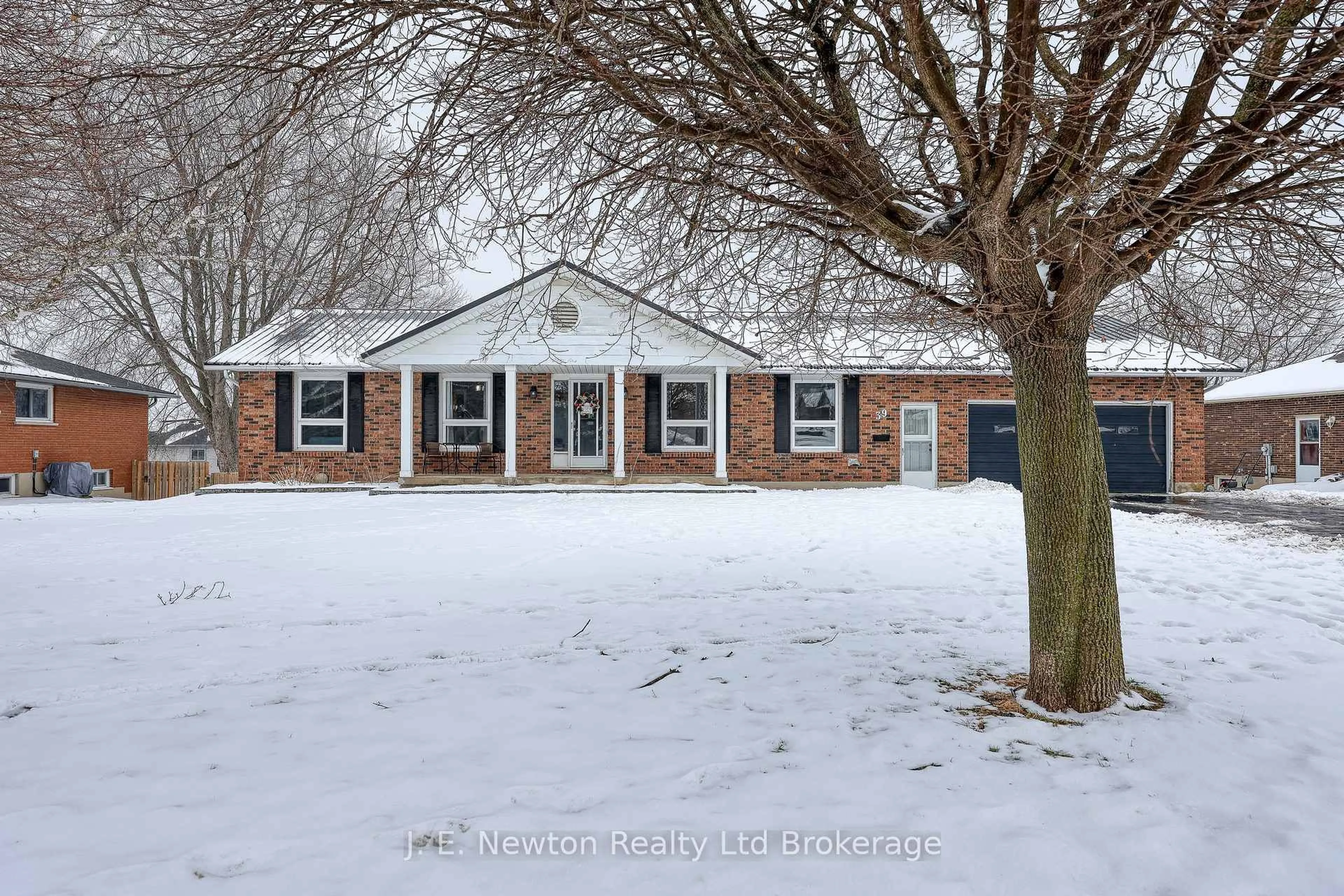 Home with brick exterior material, street for 39 North St, Tillsonburg Ontario N4G 1B9