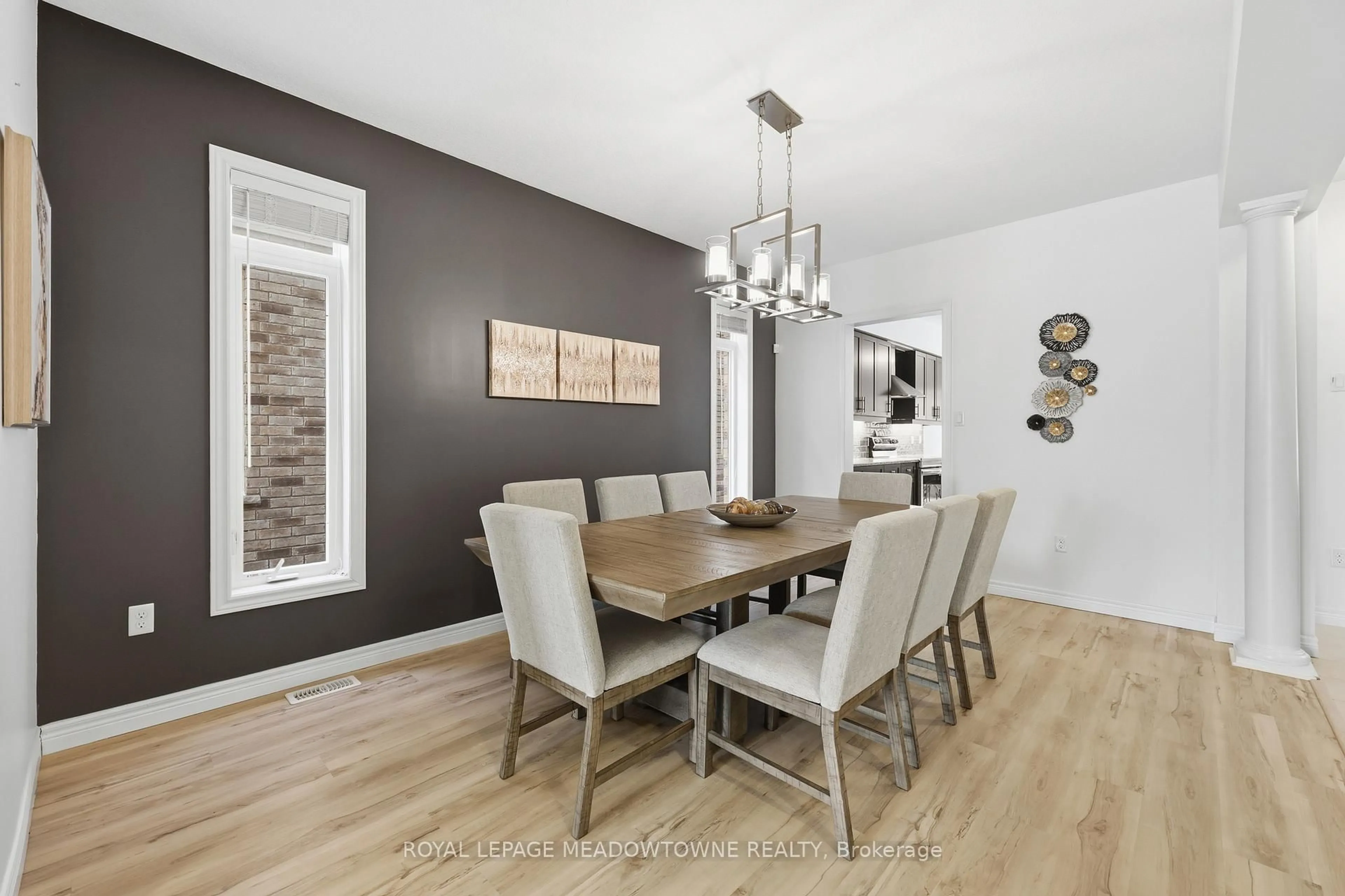 Dining room, wood/laminate floor for 63 Westra Dr, Guelph Ontario N1K 0B5