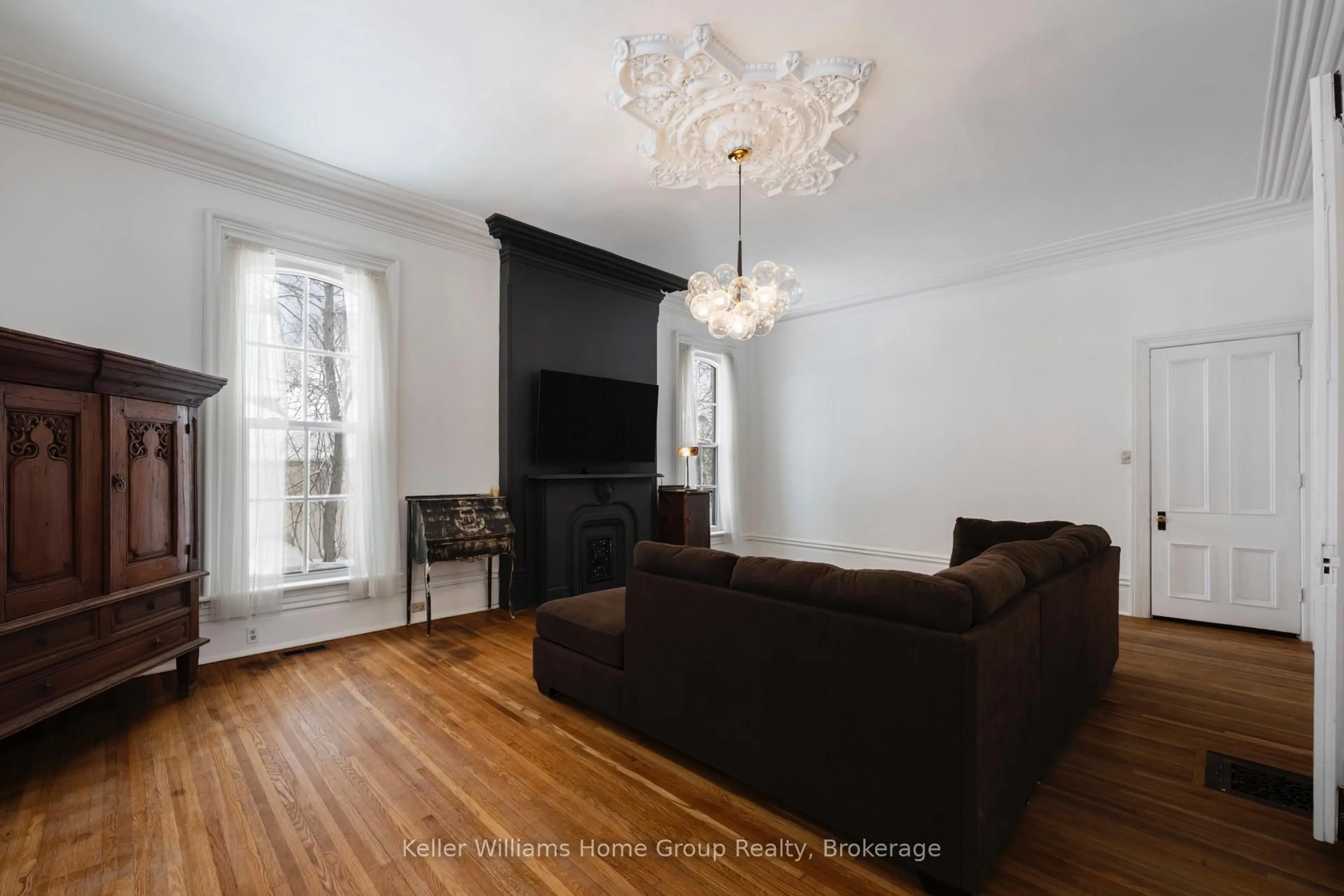 Living room with furniture, wood/laminate floor for 150 WELLINGTON St, Wellington North Ontario N0G 2L2