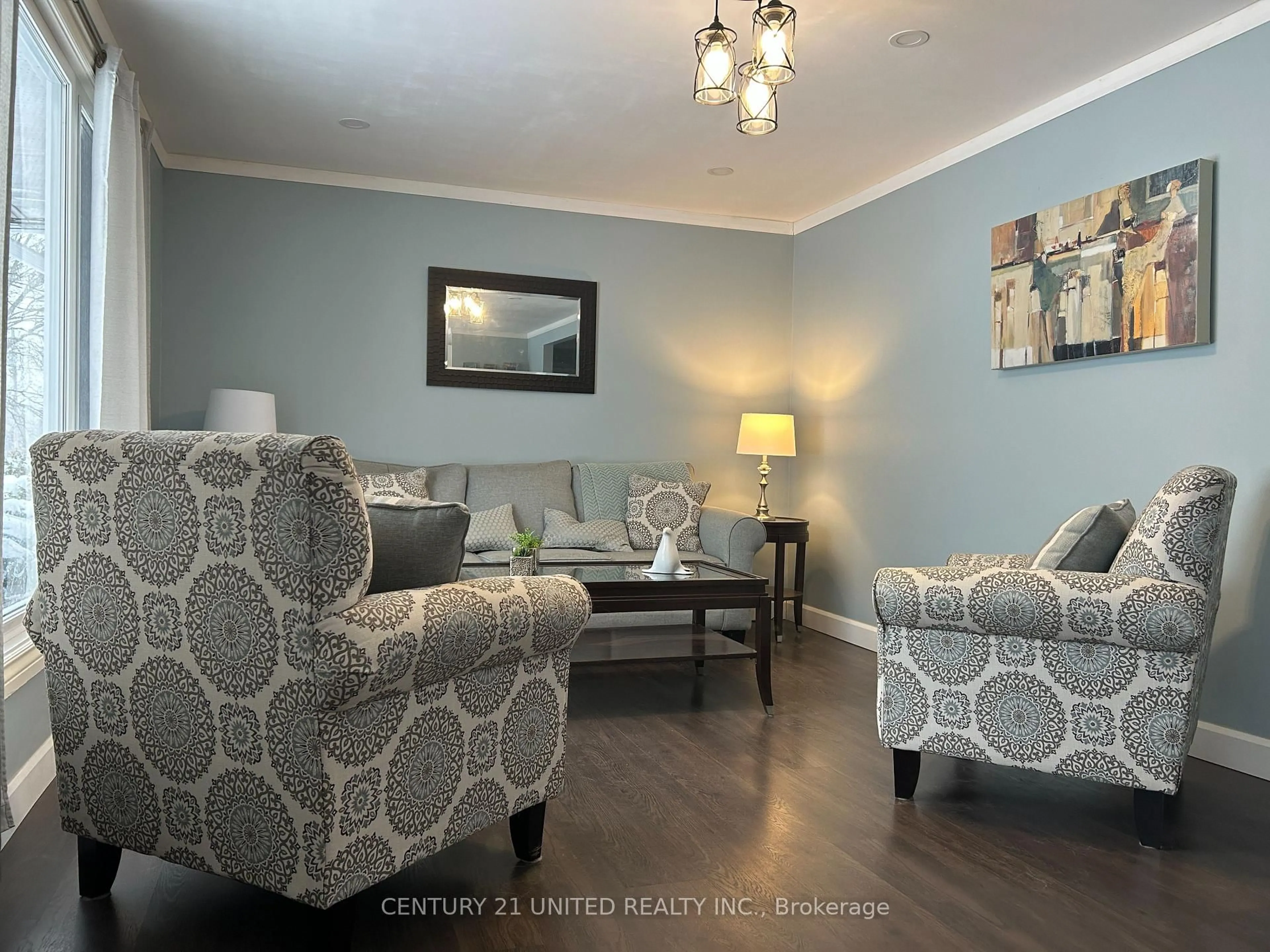 Living room with furniture, wood/laminate floor for 67 Bursthall St, Limoges Ontario K0K 2M0