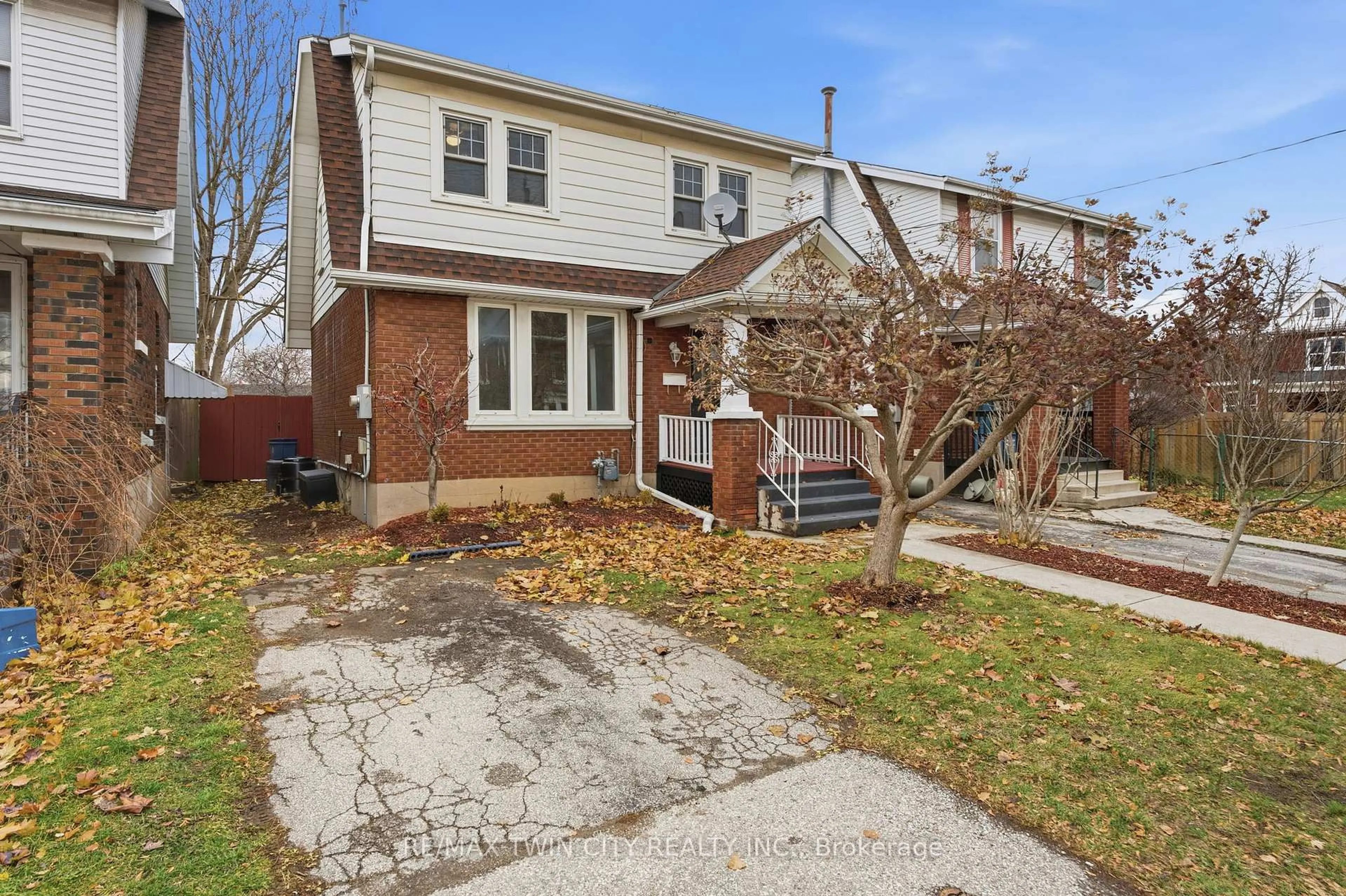 Home with brick exterior material, street for 12 St James St, Brantford Ontario N3T 3Z5