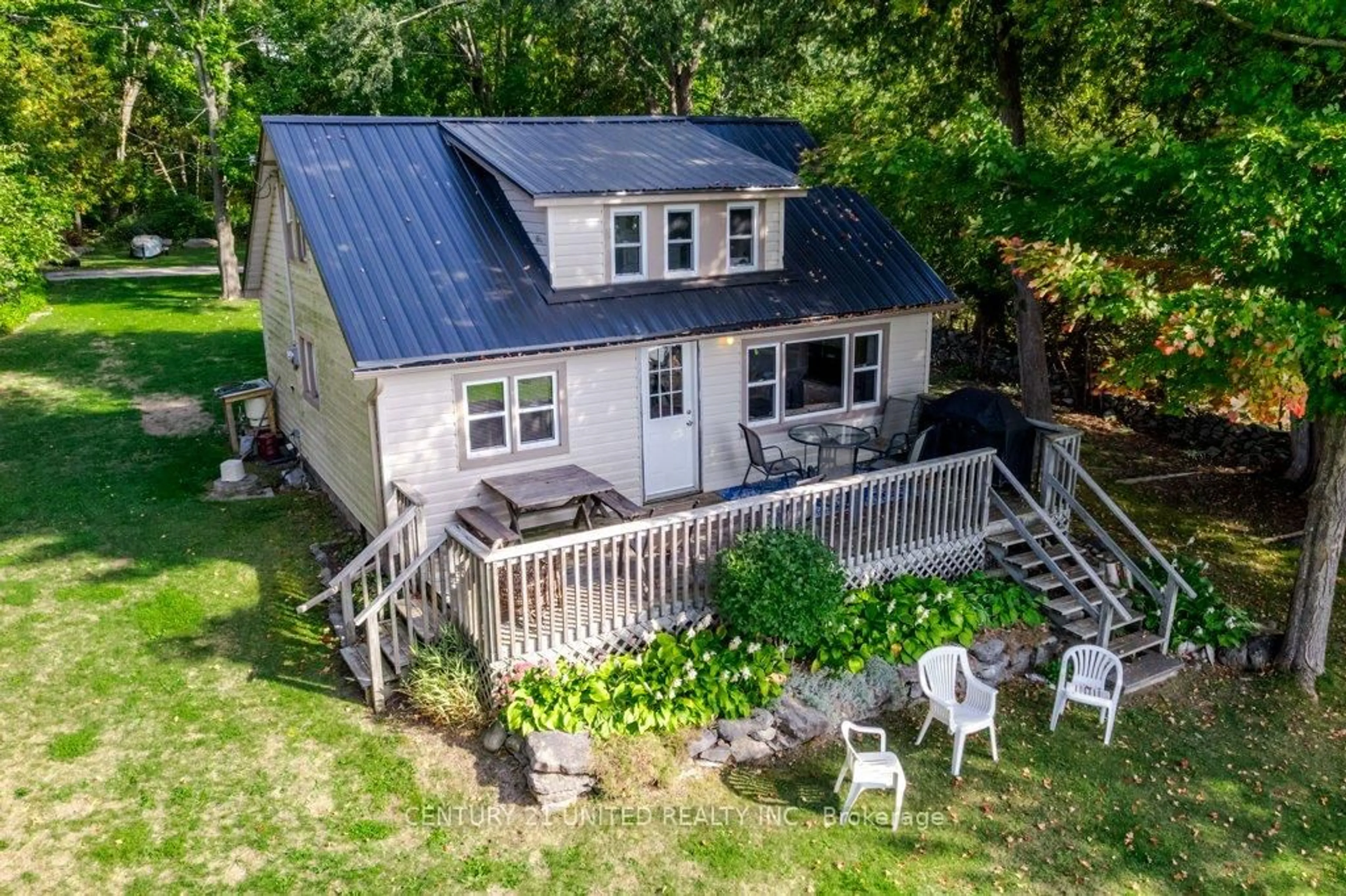 A pic from outside/outdoor area/front of a property/back of a property/a pic from drone, unknown for 2460 Fire Route 13, Selwyn Ontario K0L 2H0