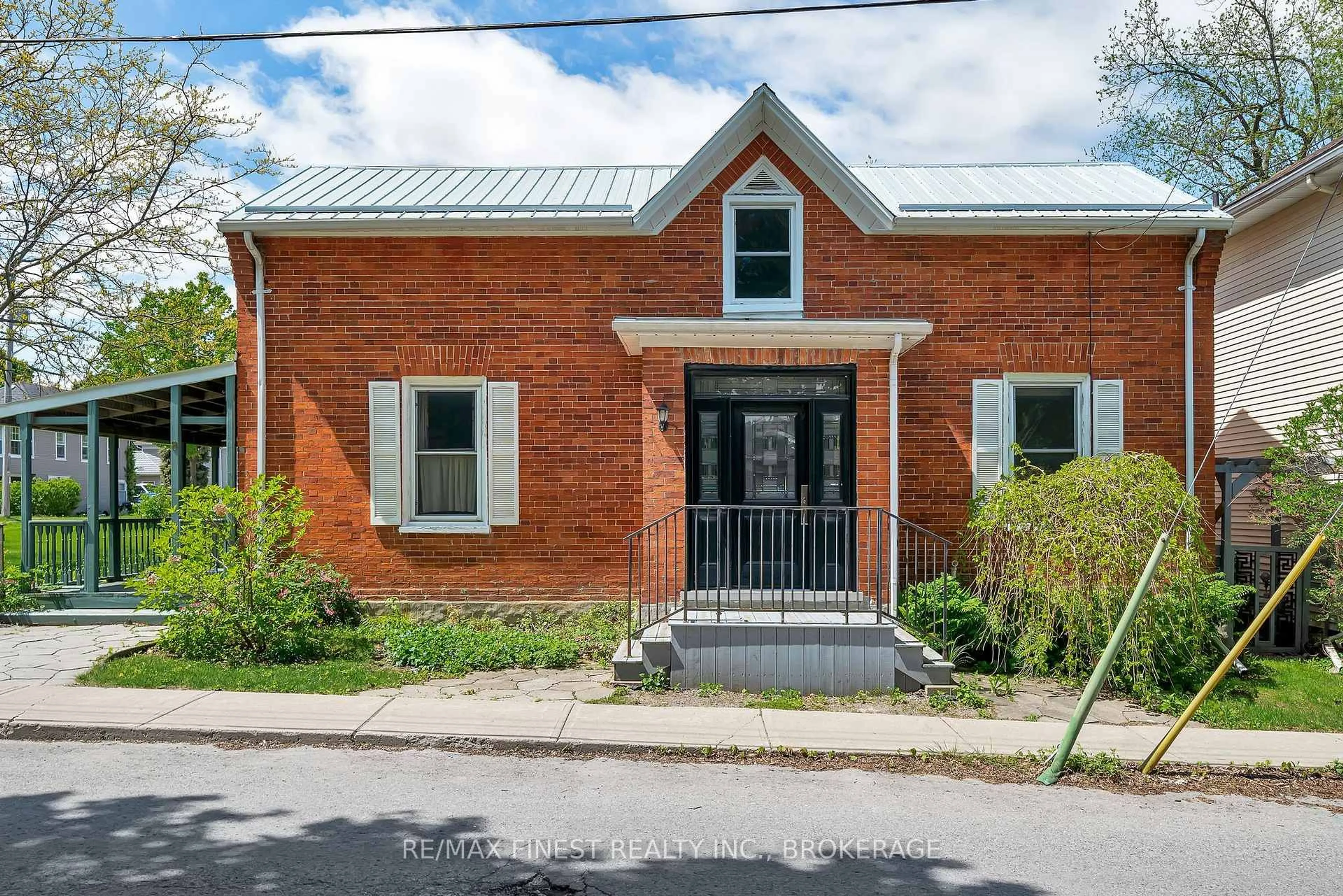 Home with brick exterior material, street for 8 Catherine St, Prince Edward County Ontario K0K 2T0