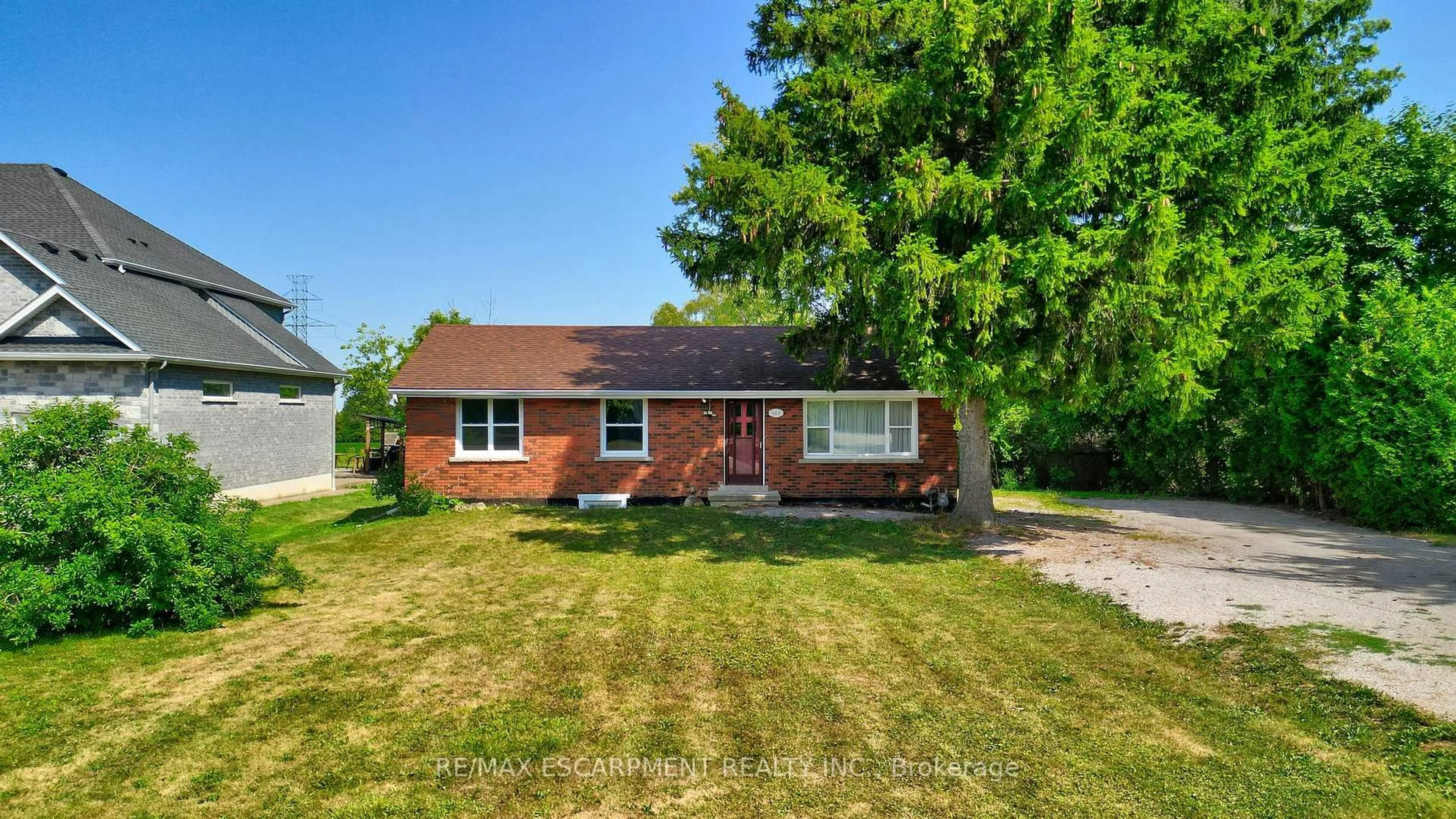 Home with brick exterior material, street for 167 Miles Rd, Hamilton Ontario L8W 1E2