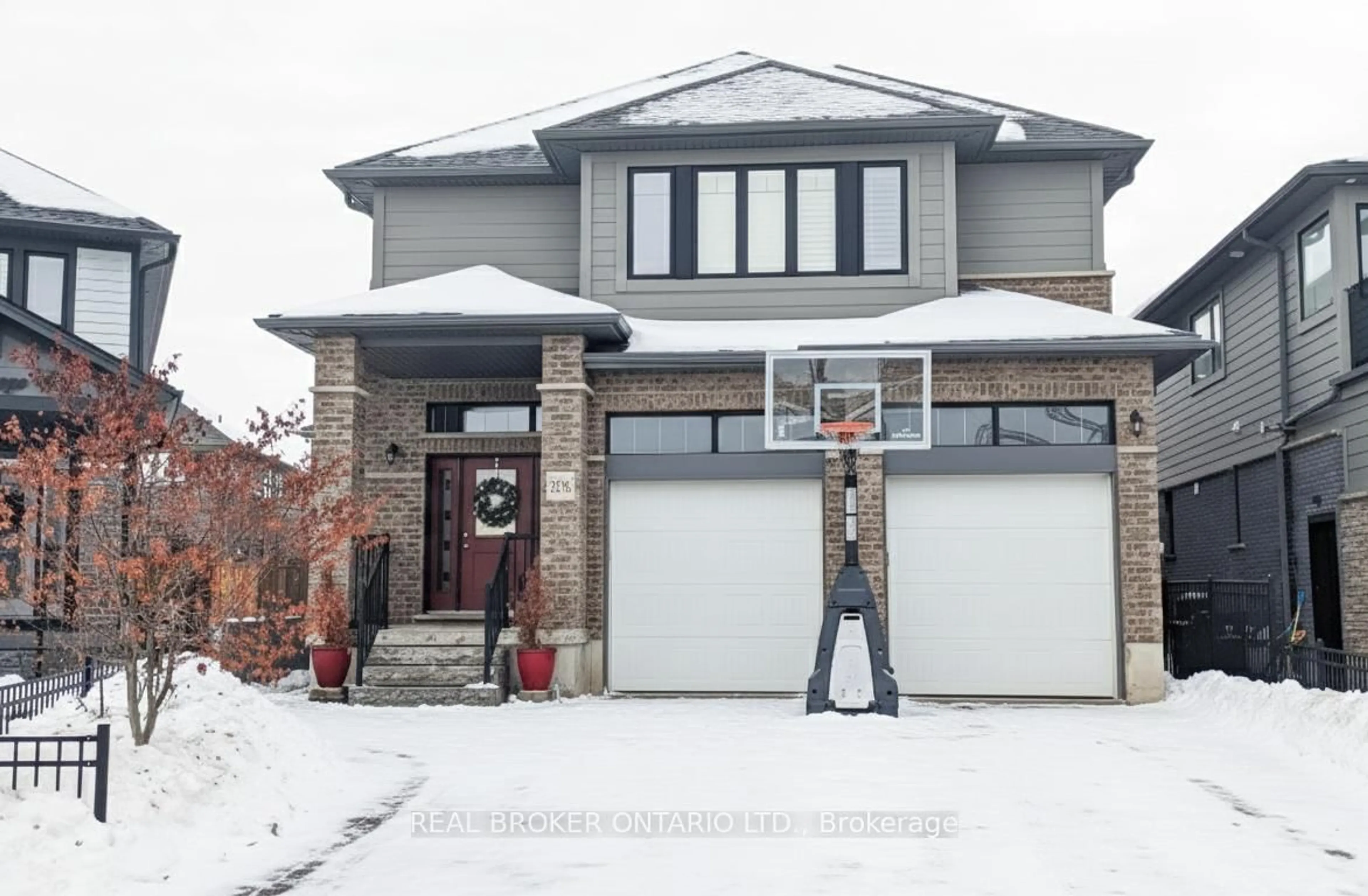 Home with brick exterior material, street for 206 Carriage Way, Waterloo Ontario N2K 0C6