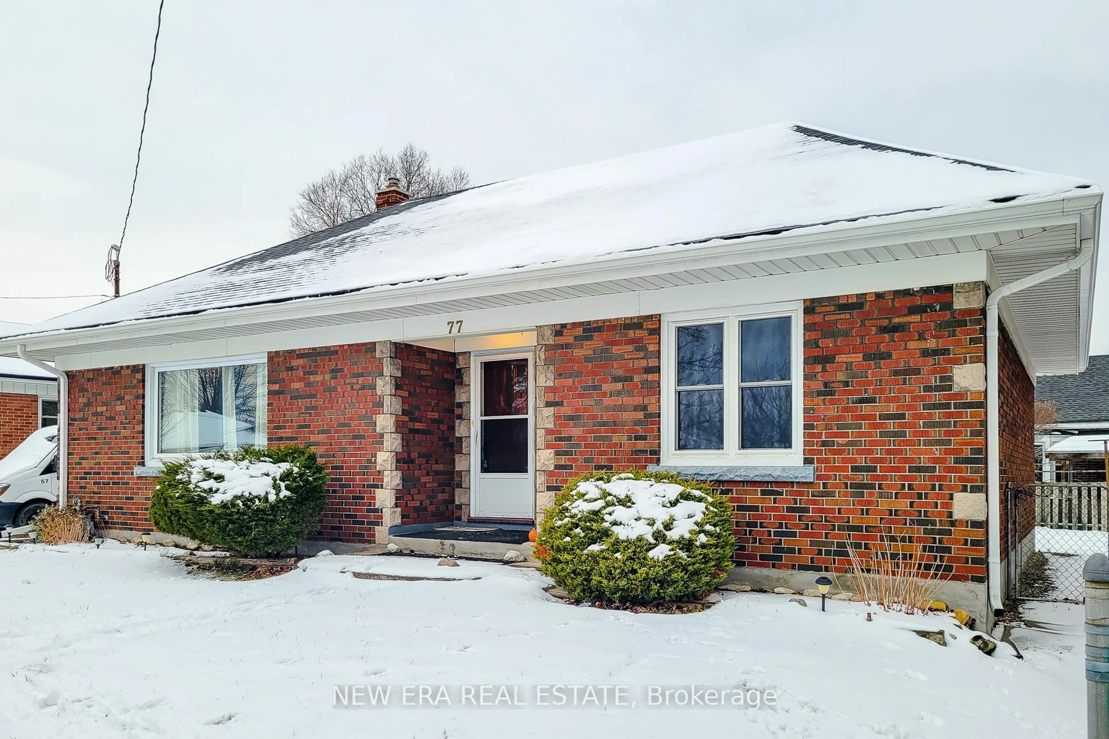 Home with brick exterior material, street for 77 Tenth Ave, Brantford Ontario N3S 1G5