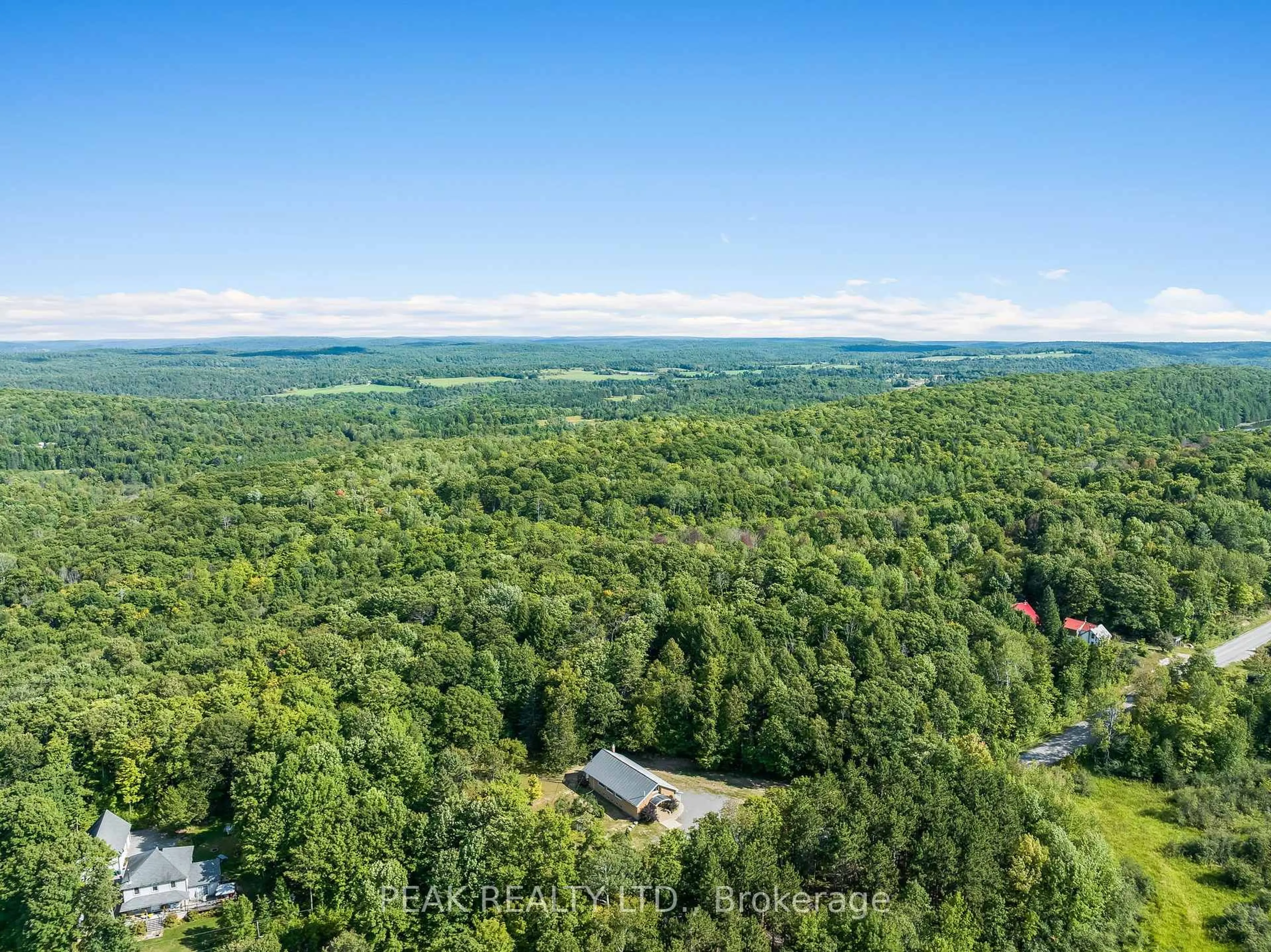 A pic from outside/outdoor area/front of a property/back of a property/a pic from drone, forest/trees view for 1812 Frontenac Rd, Griffith Ontario K0J 2R0