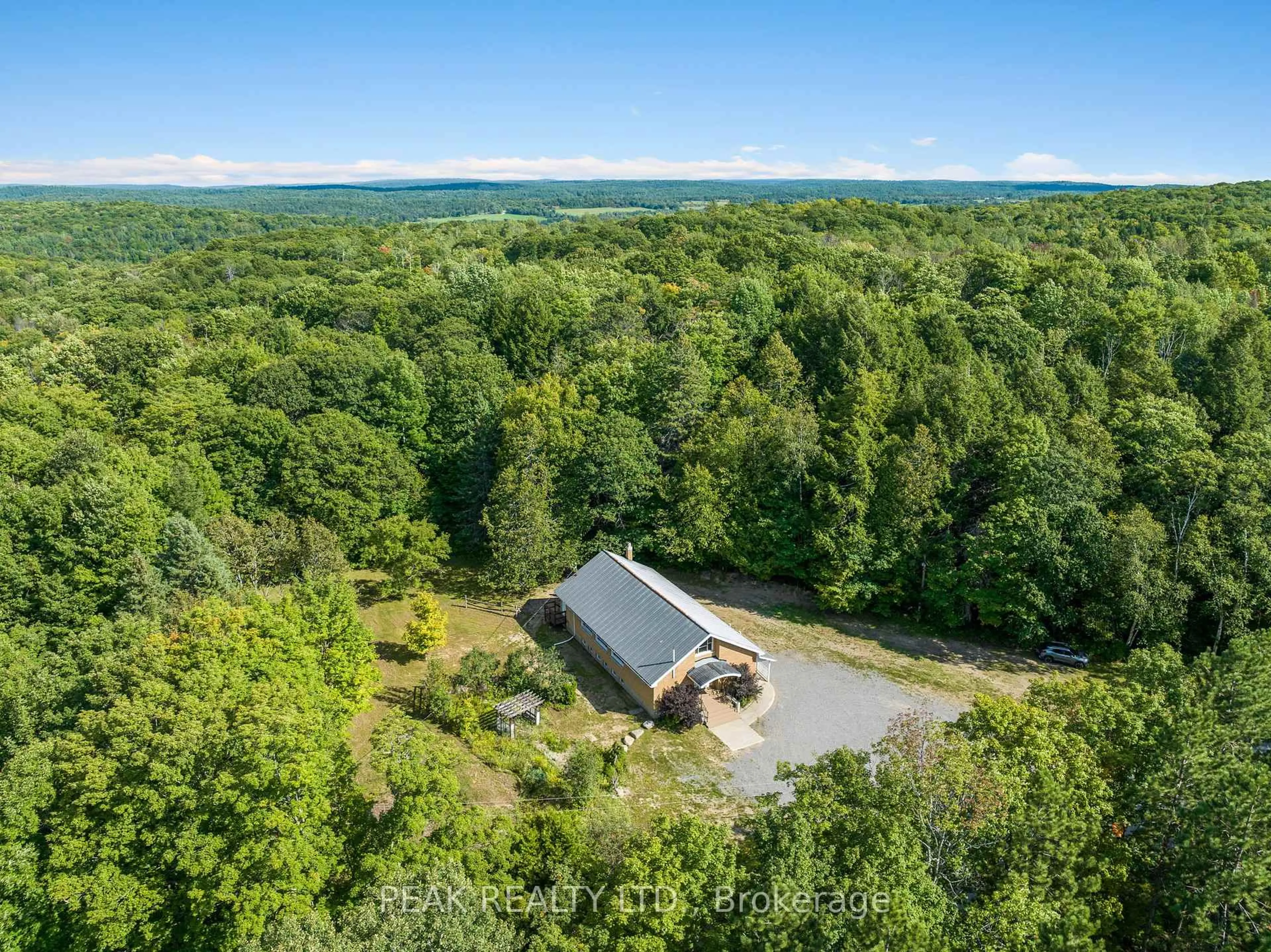 A pic from outside/outdoor area/front of a property/back of a property/a pic from drone, forest/trees view for 1812 Frontenac Rd, Griffith Ontario K0J 2R0