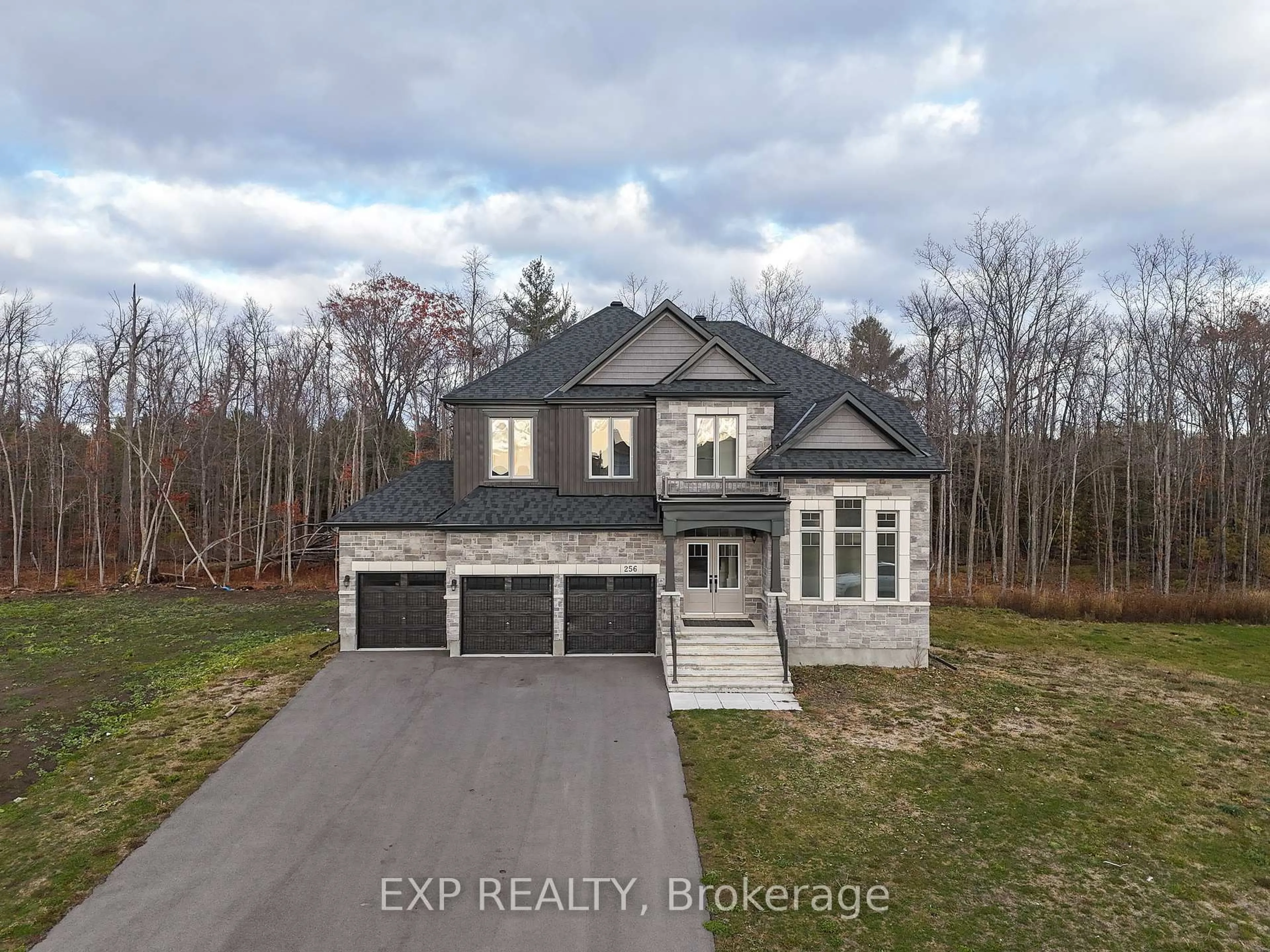 A pic from outside/outdoor area/front of a property/back of a property/a pic from drone, street for 256 Antler Crt, Almonte Ontario K0A 1A0