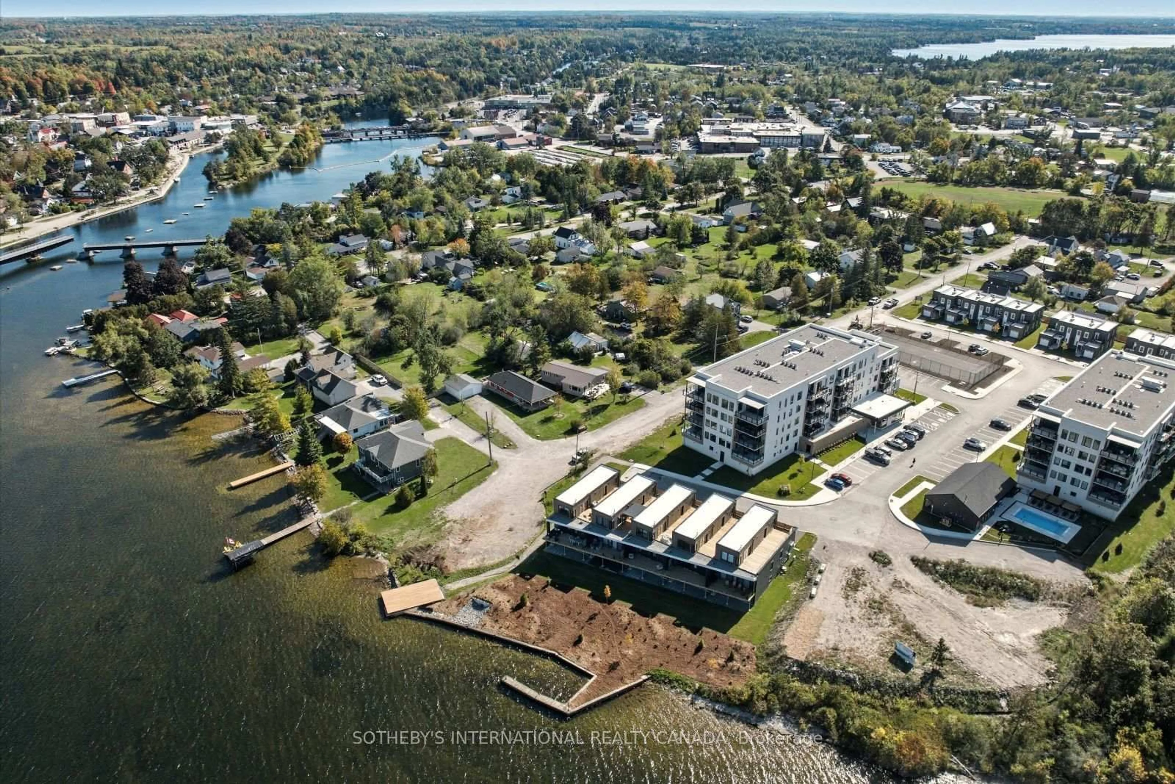 A pic from outside/outdoor area/front of a property/back of a property/a pic from drone, water/lake/river/ocean view for 19 West St N St #17, Kawartha Lakes Ontario K0M 1N0