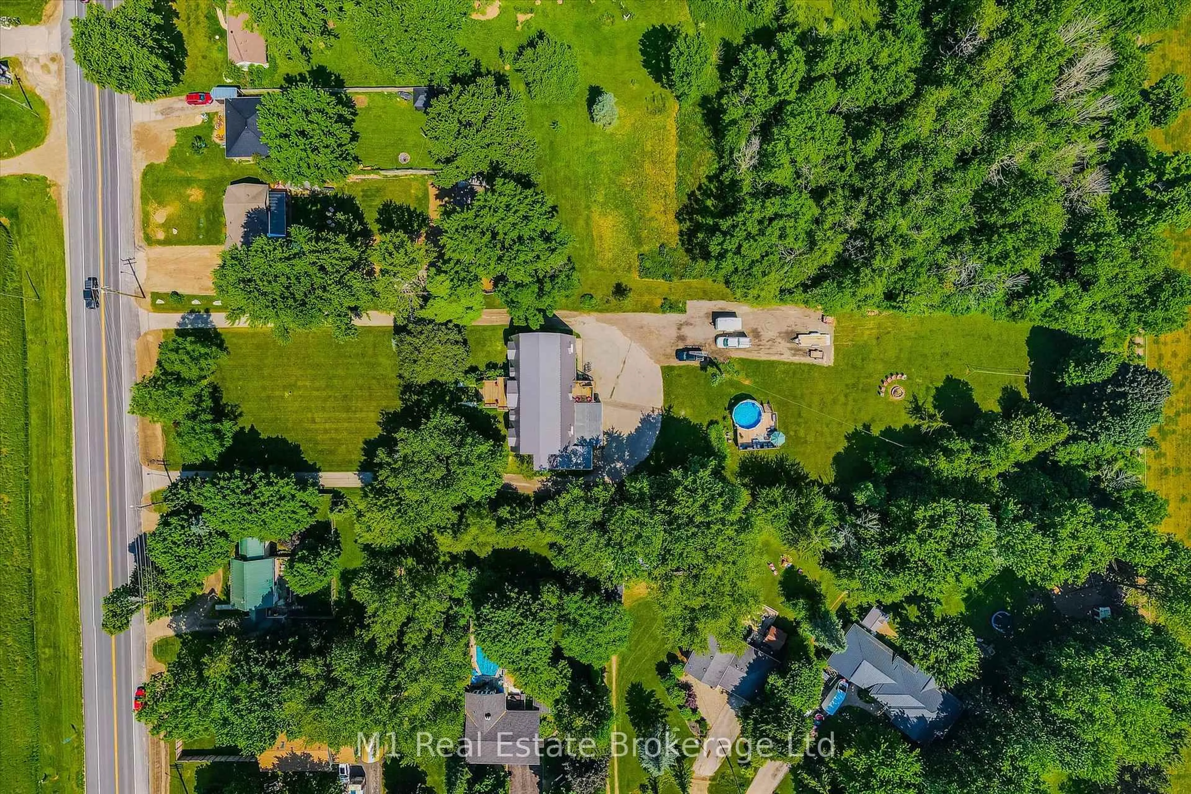 A pic from outside/outdoor area/front of a property/back of a property/a pic from drone, forest/trees view for 128 Wellington Road 7 Rd, Centre Wellington Ontario N0B 1S0