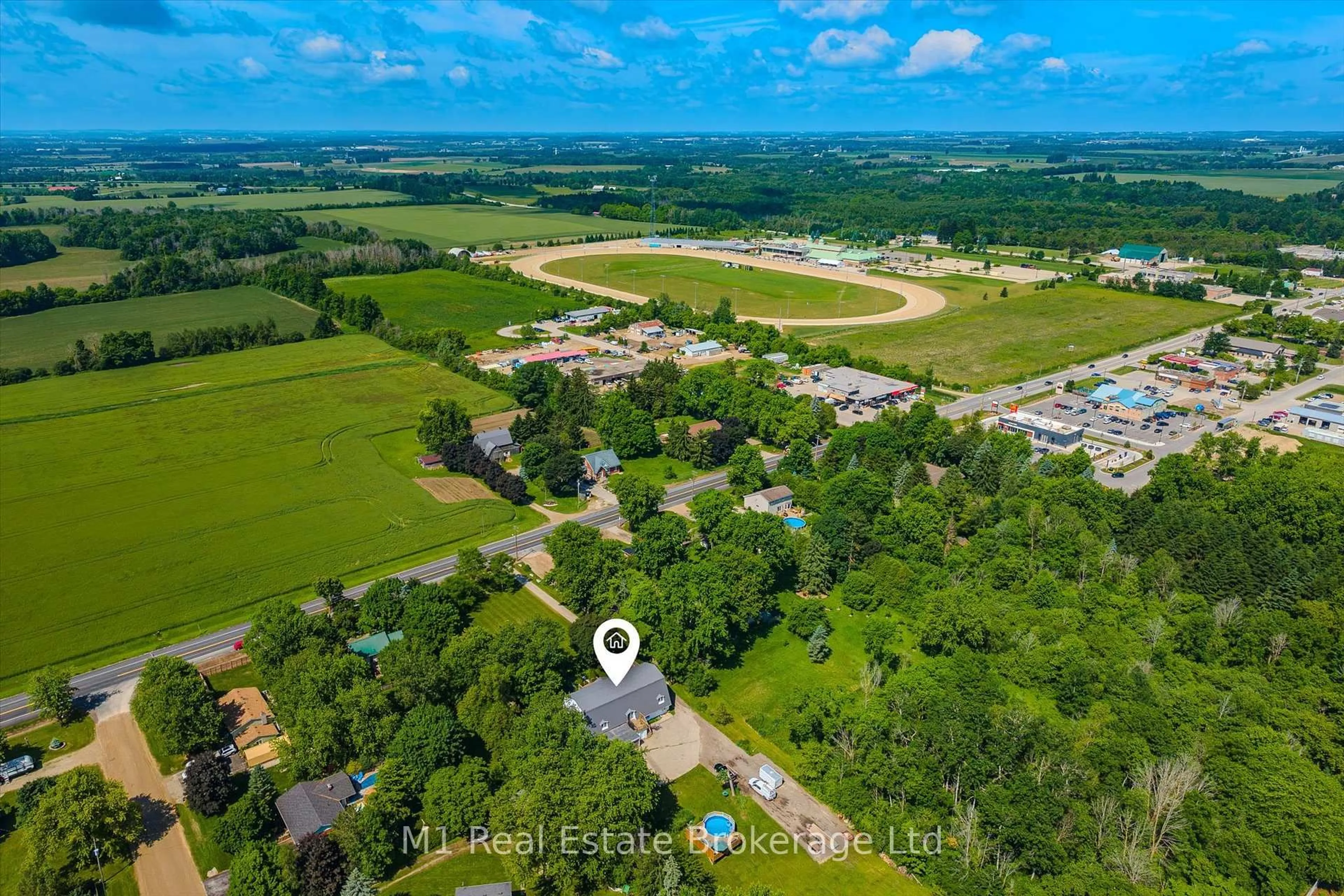 A pic from outside/outdoor area/front of a property/back of a property/a pic from drone, water/lake/river/ocean view for 128 Wellington Road 7 Rd, Centre Wellington Ontario N0B 1S0