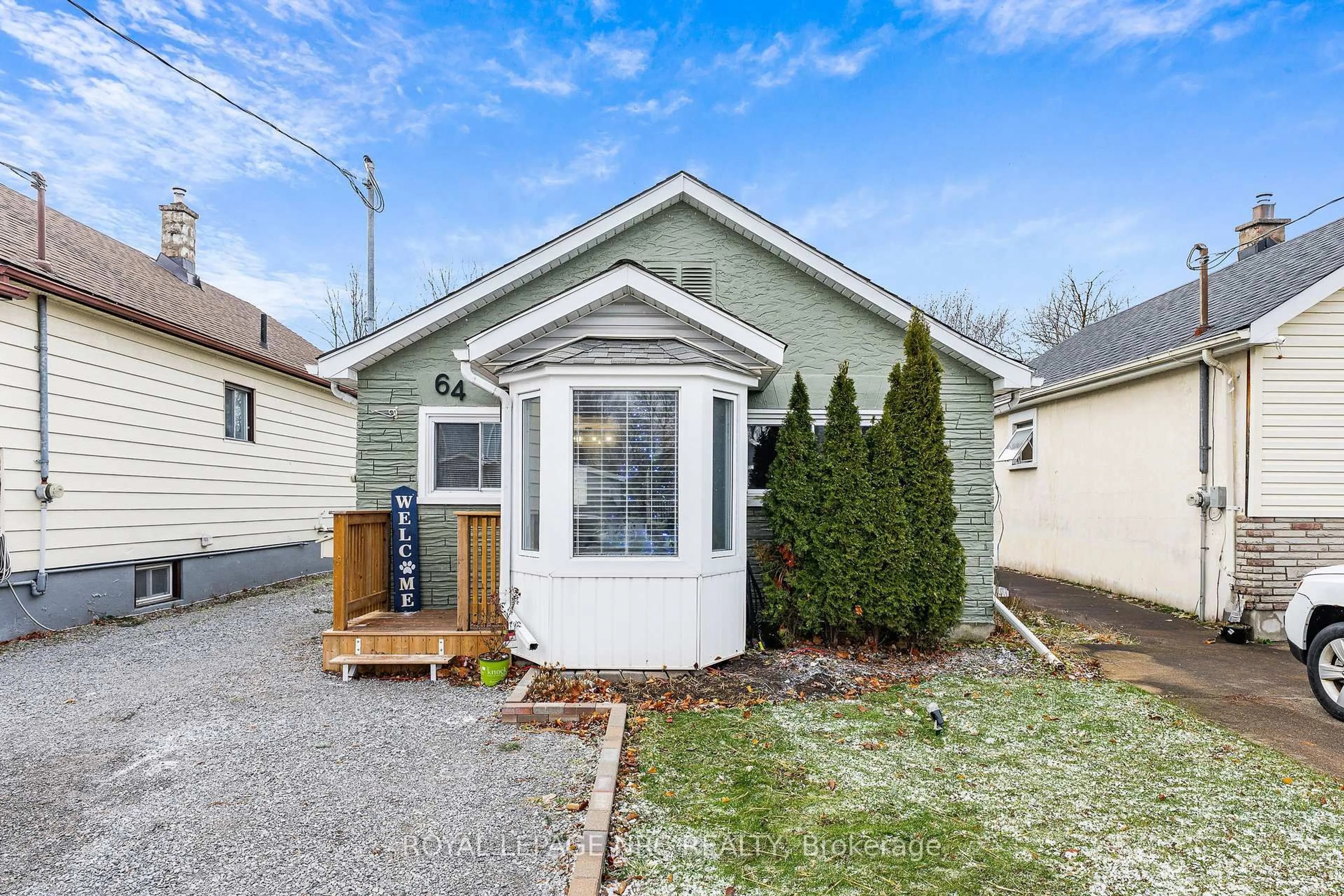 Home with vinyl exterior material, street for 64 Churchill St, St. Catharines Ontario L2S 2P5