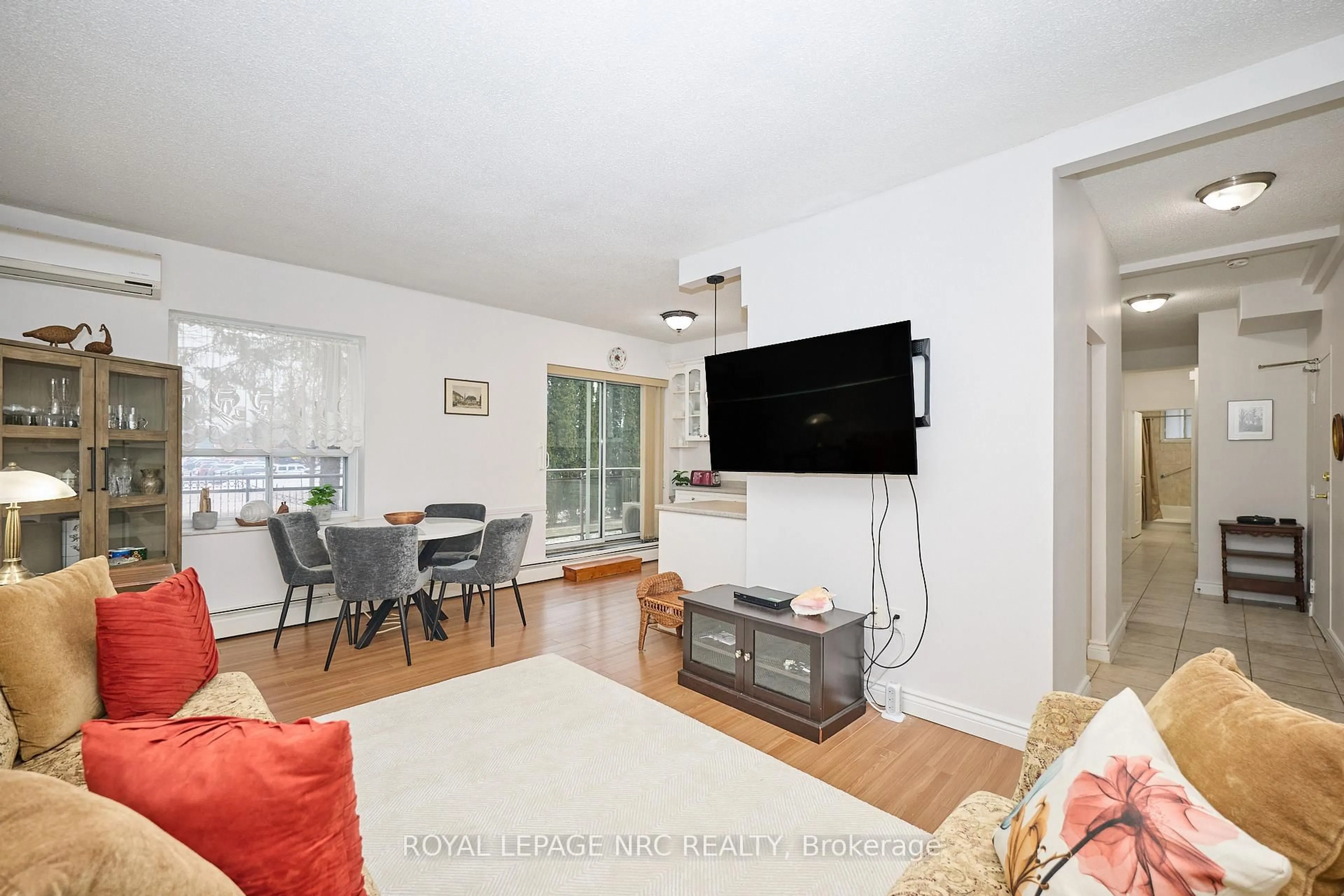 Living room with furniture, unknown for 6390 Huggins St #101, Niagara Falls Ontario L2J 1H1