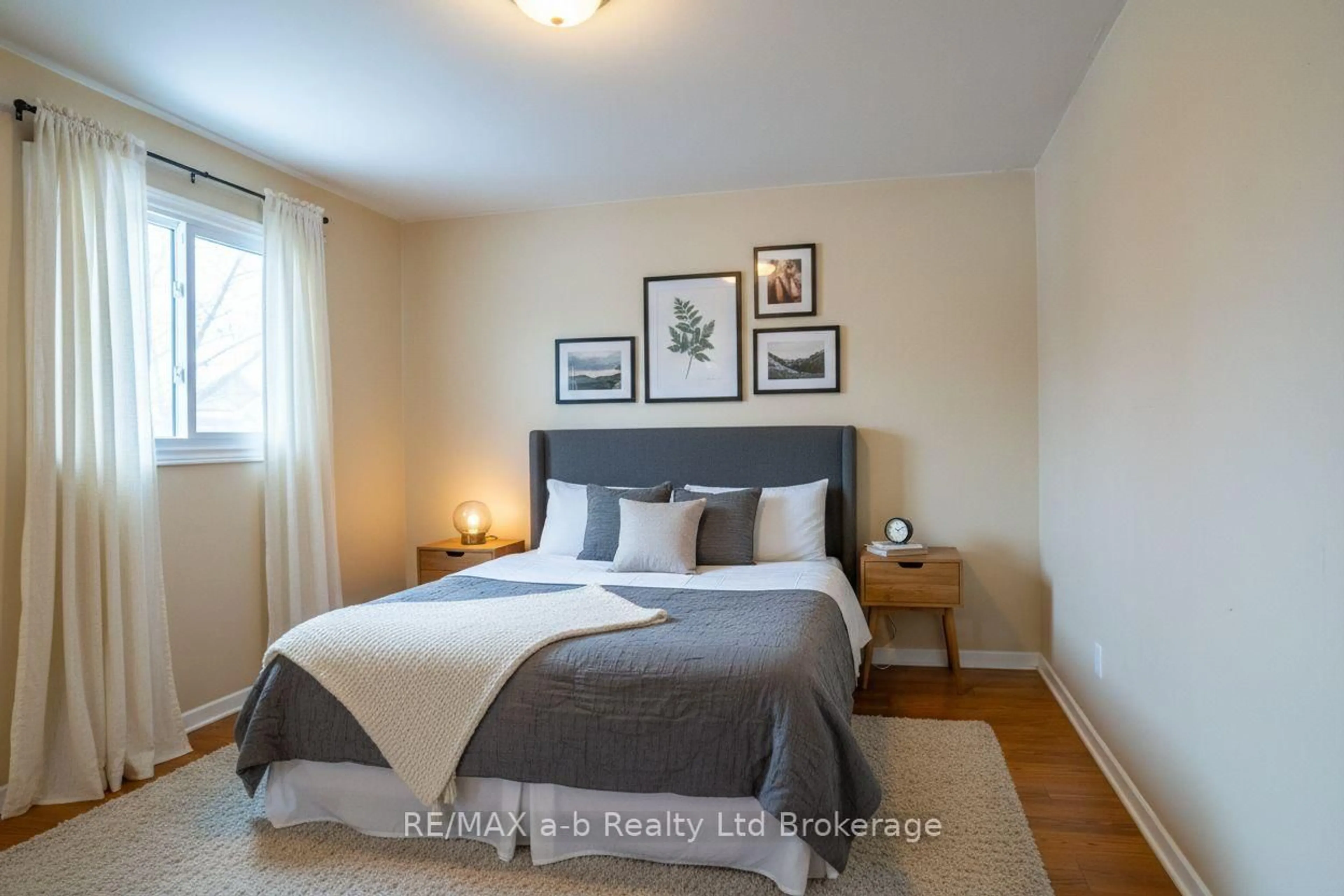 Bedroom with bed, wood/laminate floor for 10 Dufferin St #1, Norwich Ontario N0J 1P0