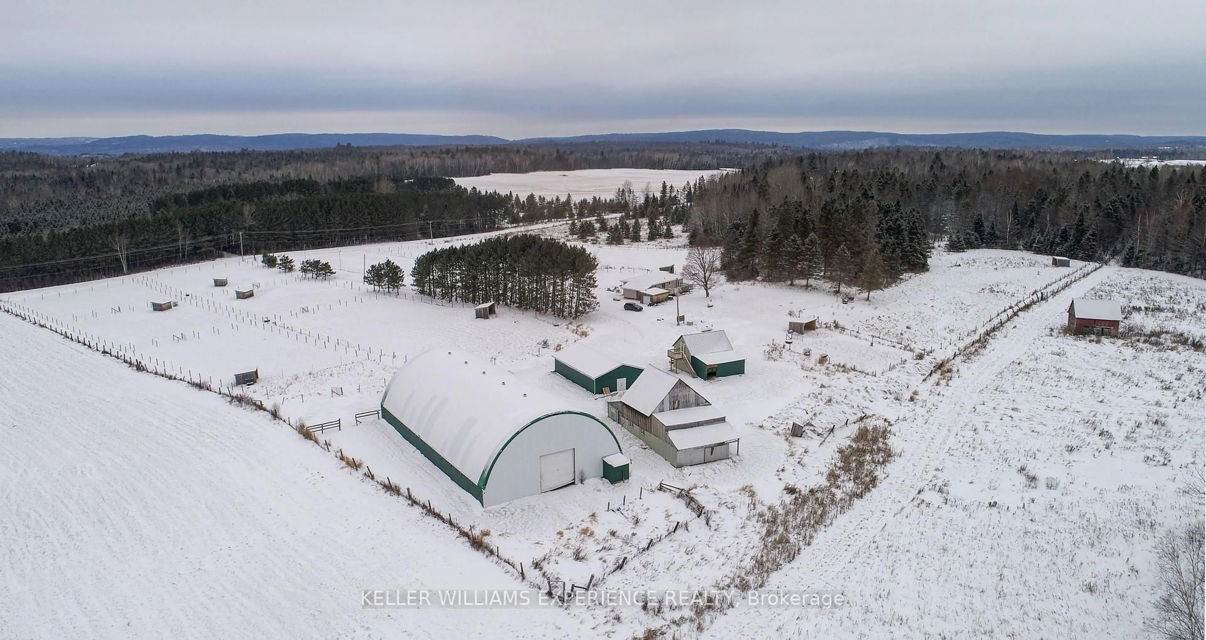 A pic from outside/outdoor area/front of a property/back of a property/a pic from drone, mountain view for 744 Trunk Rd, Bonfield Ontario P0H 2E0