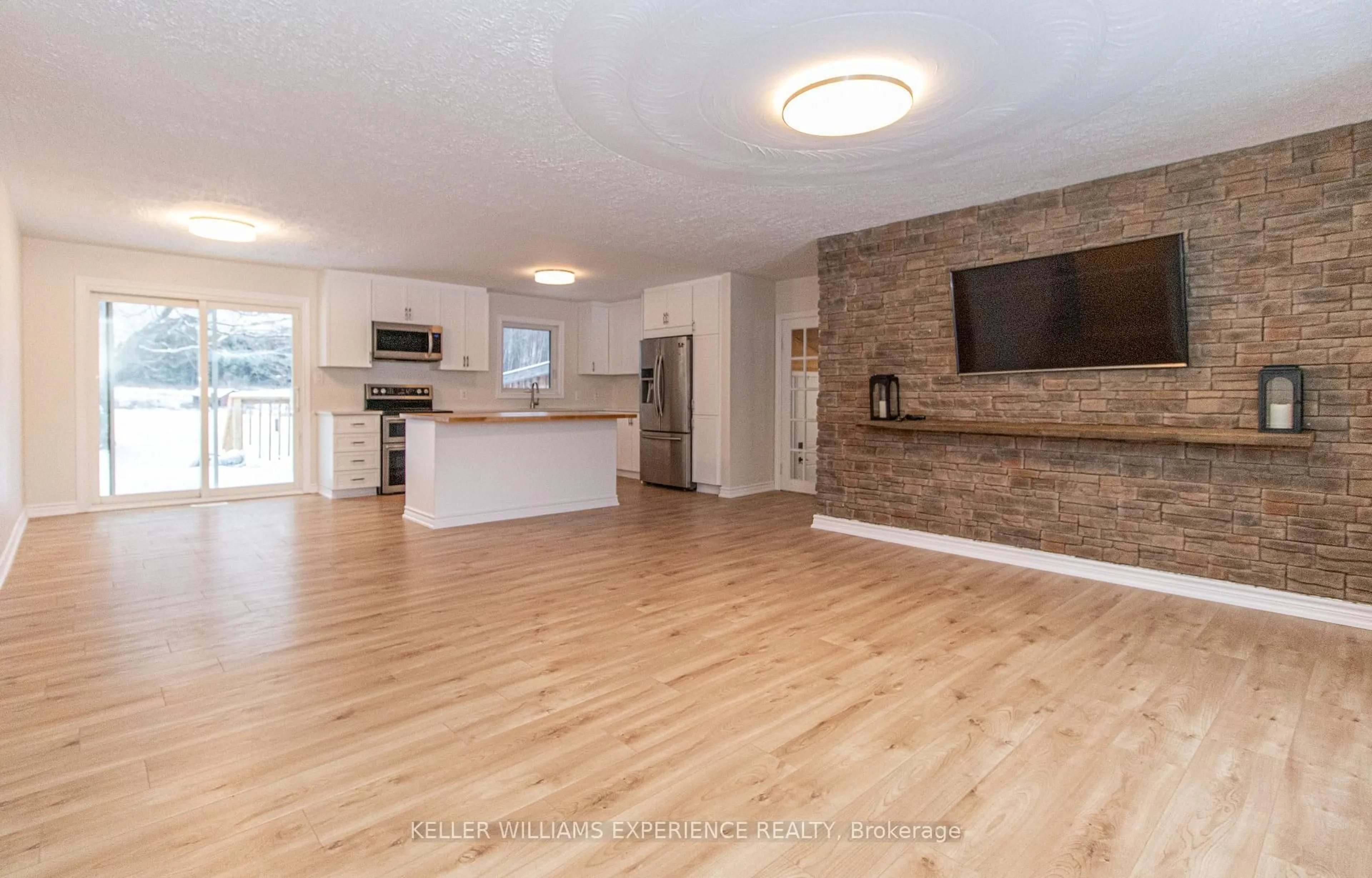 Open concept kitchen, wood/laminate floor for 744 Trunk Rd, Bonfield Ontario P0H 2E0