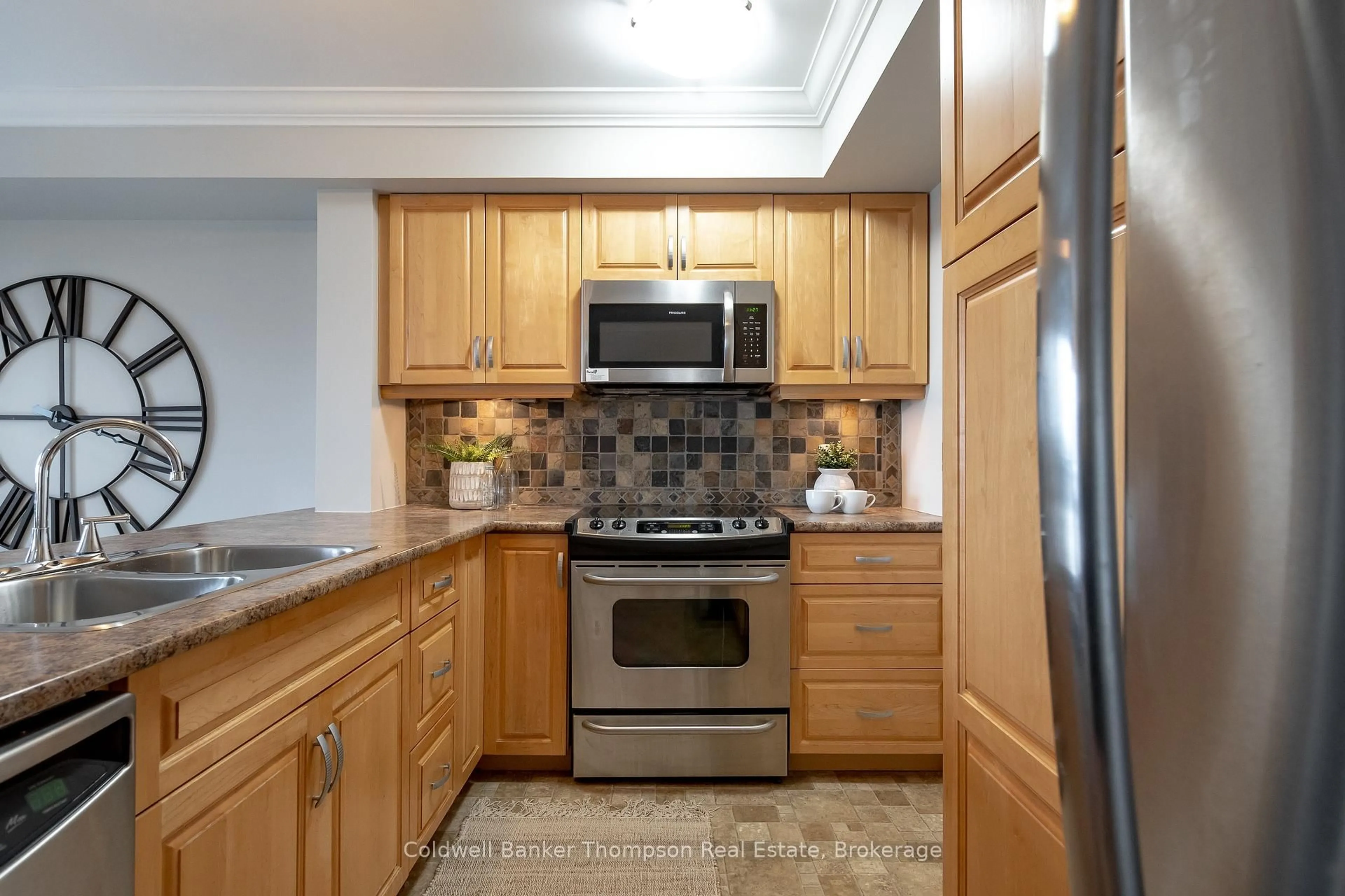 Standard kitchen, ceramic/tile floor for 26 Dairy Lane #405, Huntsville Ontario P1H 0A4