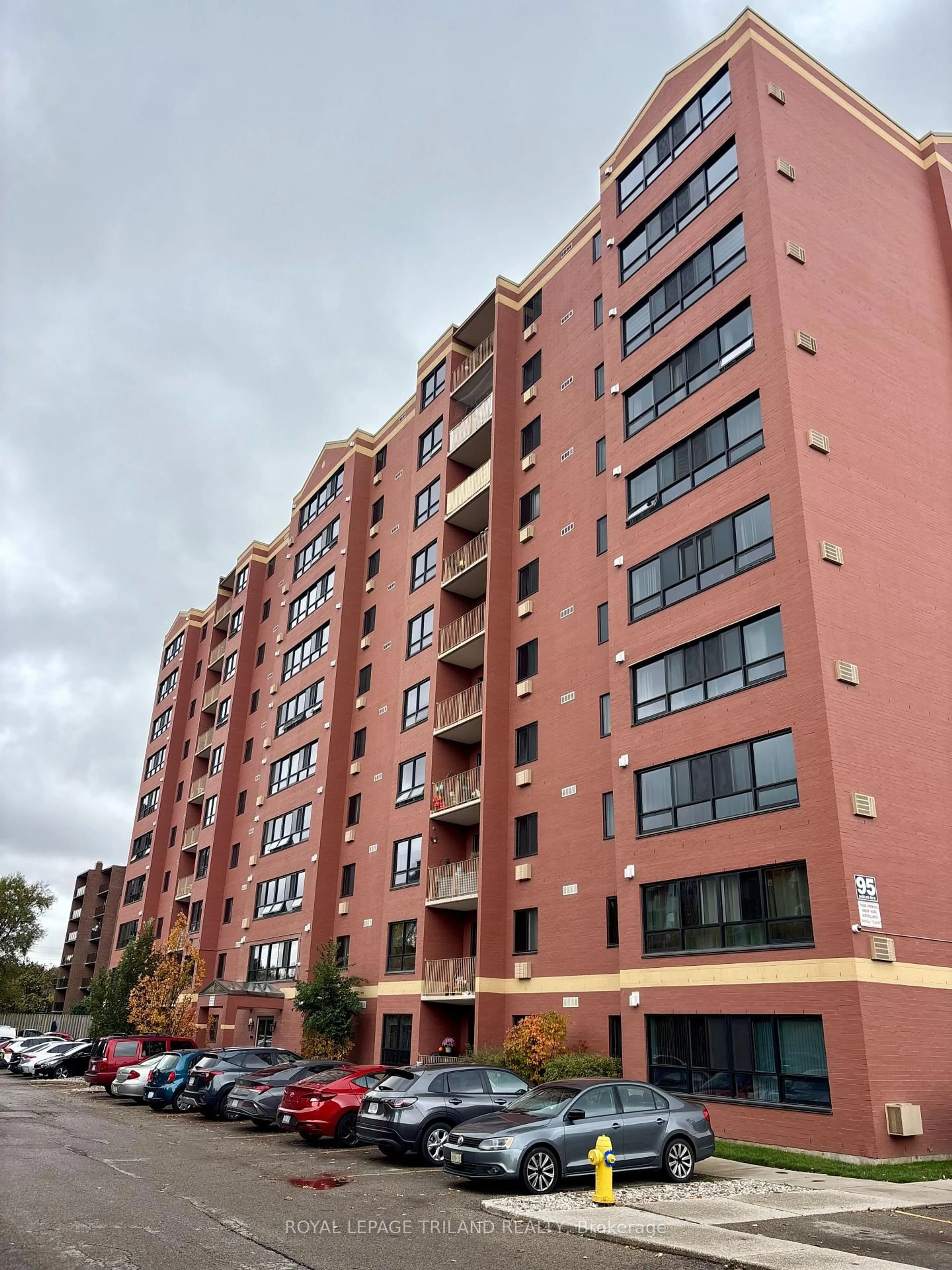 A pic from outside/outdoor area/front of a property/back of a property/a pic from drone, unknown for 95 Baseline Rd #507, London South Ontario N6J 4X3