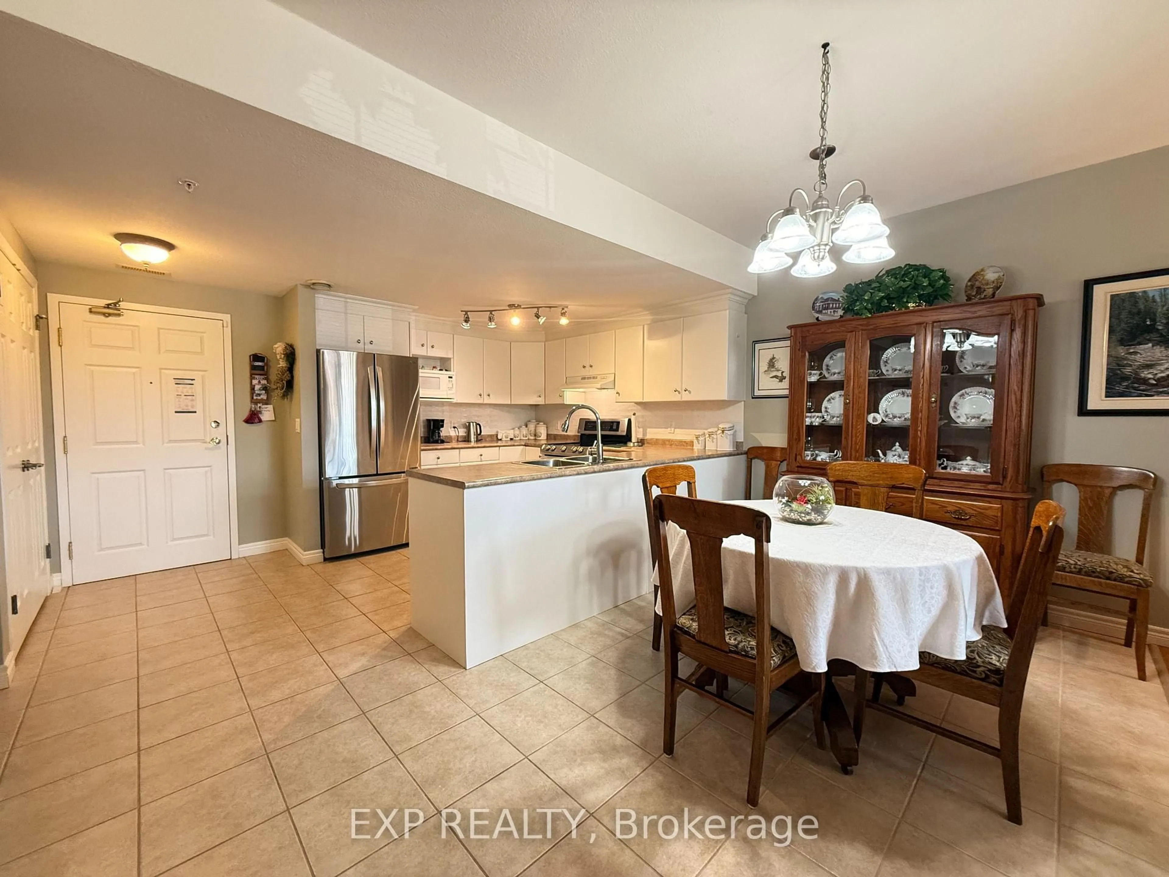 Open concept kitchen, ceramic/tile floor for 20 Station Sq #103, Centre Wellington Ontario N0B 1S0