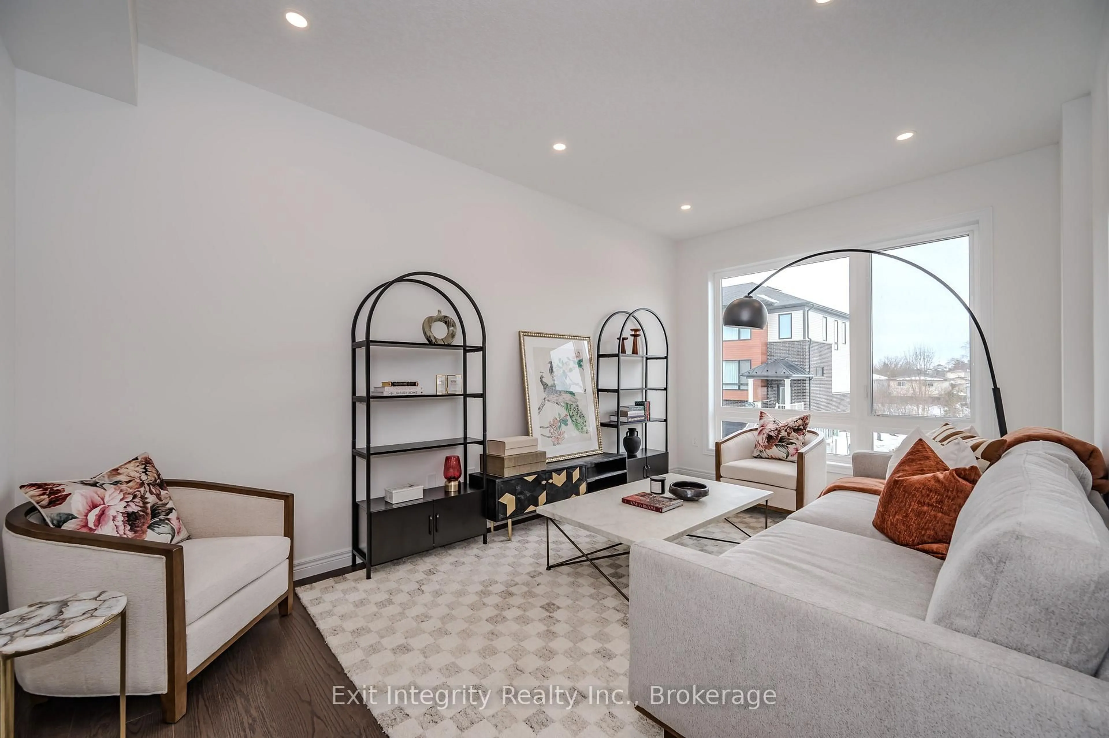 Living room with furniture, ceramic/tile floor for 21 Sora Lane, Guelph Ontario N1E 0T4