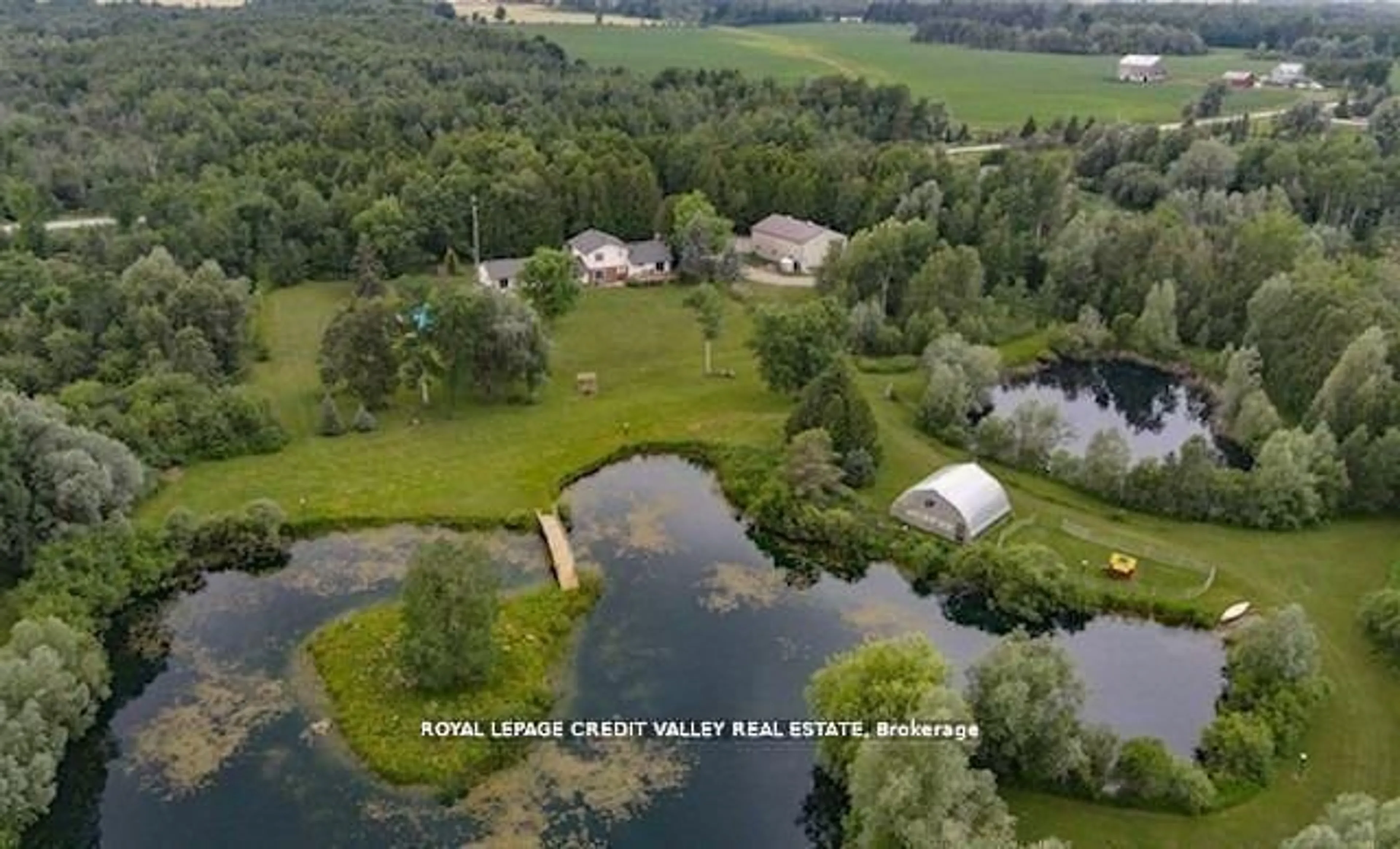 A pic from outside/outdoor area/front of a property/back of a property/a pic from drone, water/lake/river/ocean view for 476345 3rd Line, Melancthon Ontario L9V 1T4