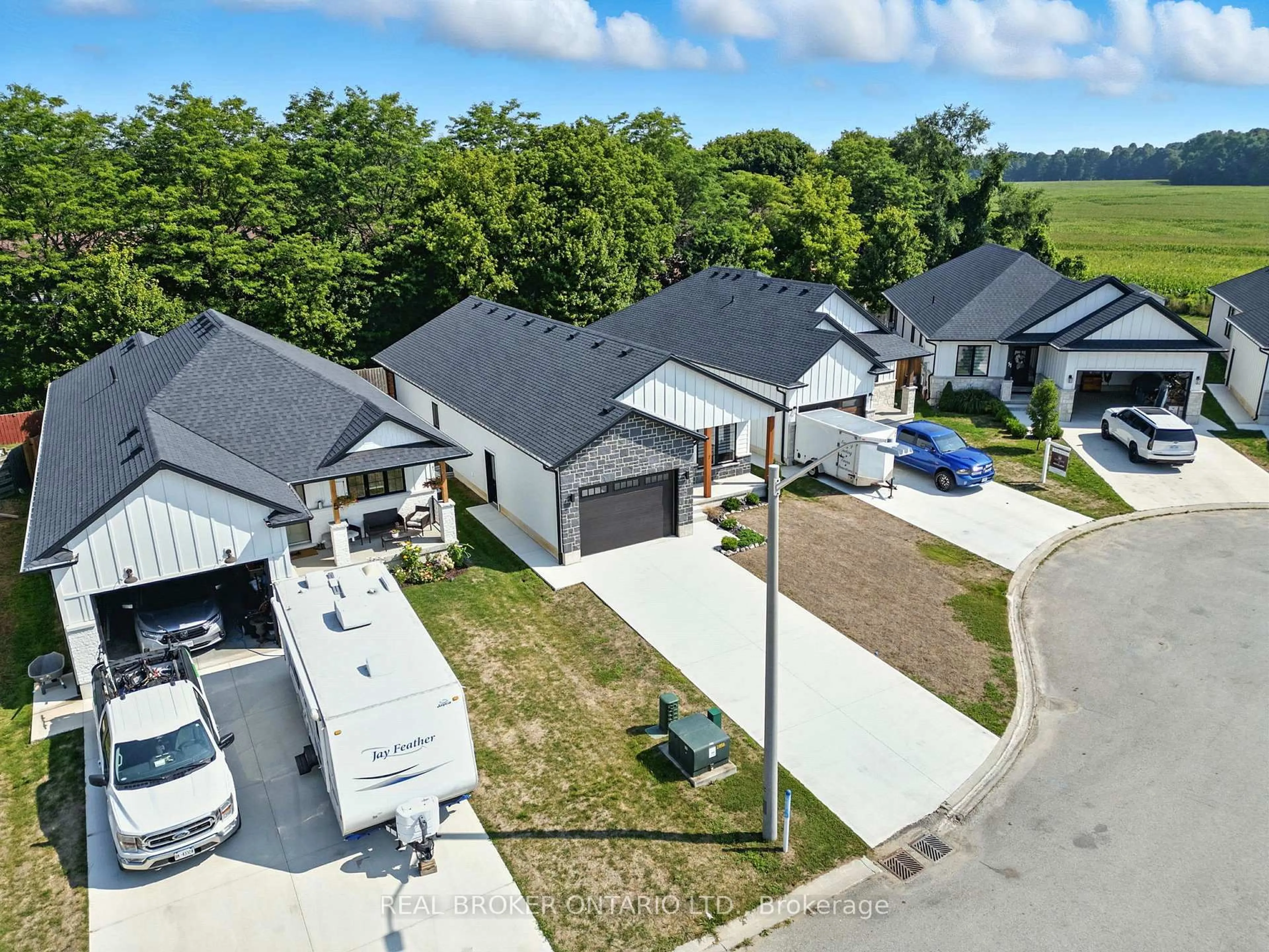 A pic from outside/outdoor area/front of a property/back of a property/a pic from drone, street for 7 MacNeil Crt, Bayham Ontario N0J 1T0