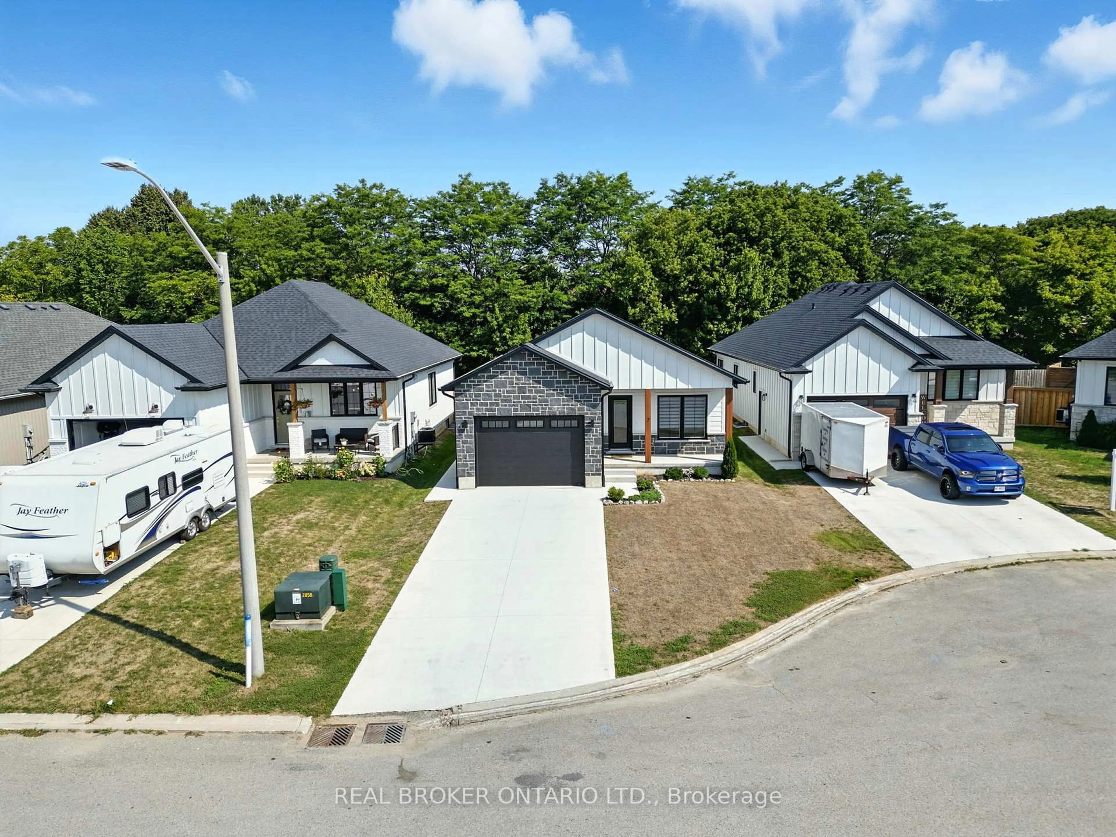 A pic from outside/outdoor area/front of a property/back of a property/a pic from drone, street for 7 MacNeil Crt, Bayham Ontario N0J 1T0