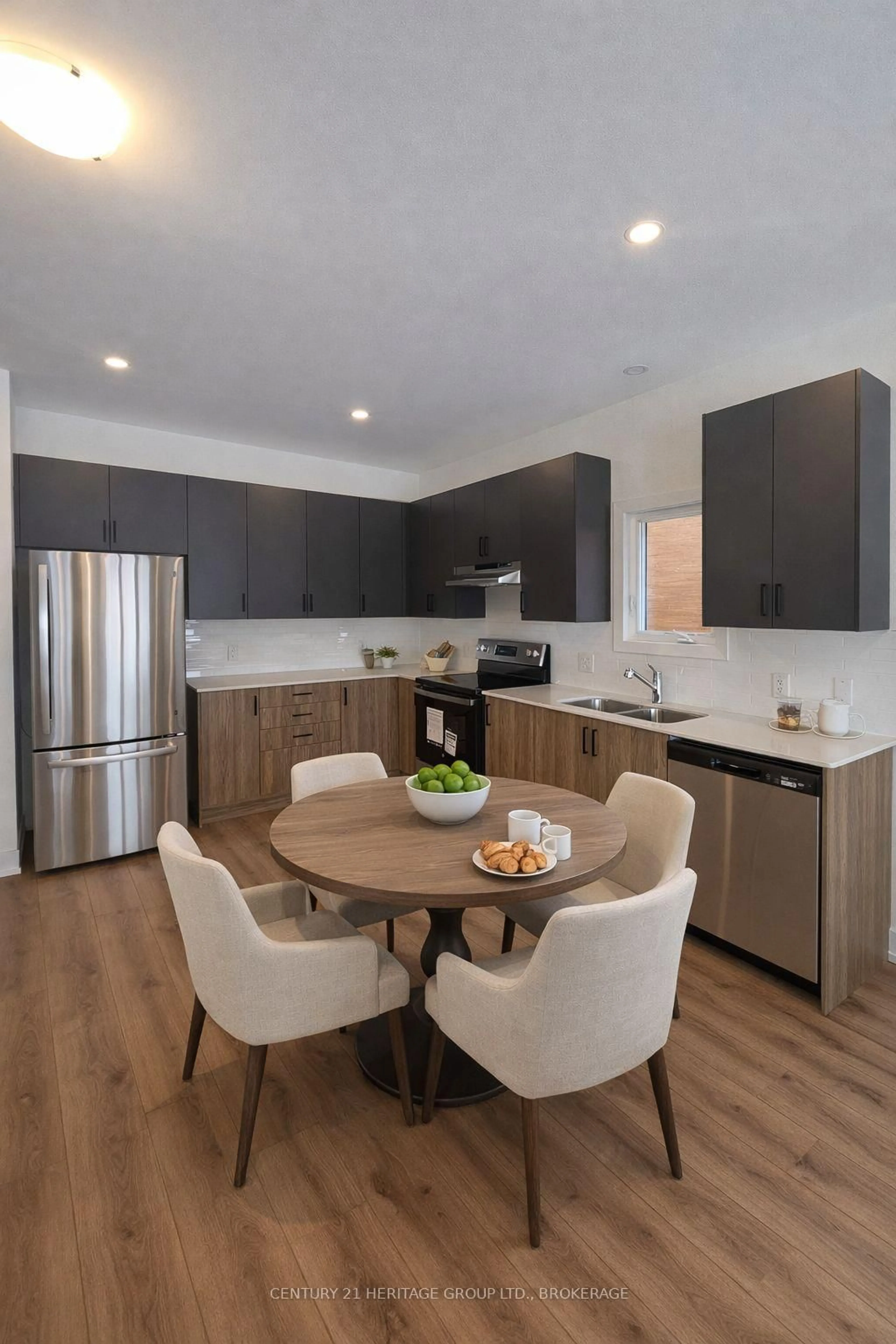 Open concept kitchen, wood/laminate floor for 60 Dusenbury Dr, Newburgh Ontario K0K 2S0