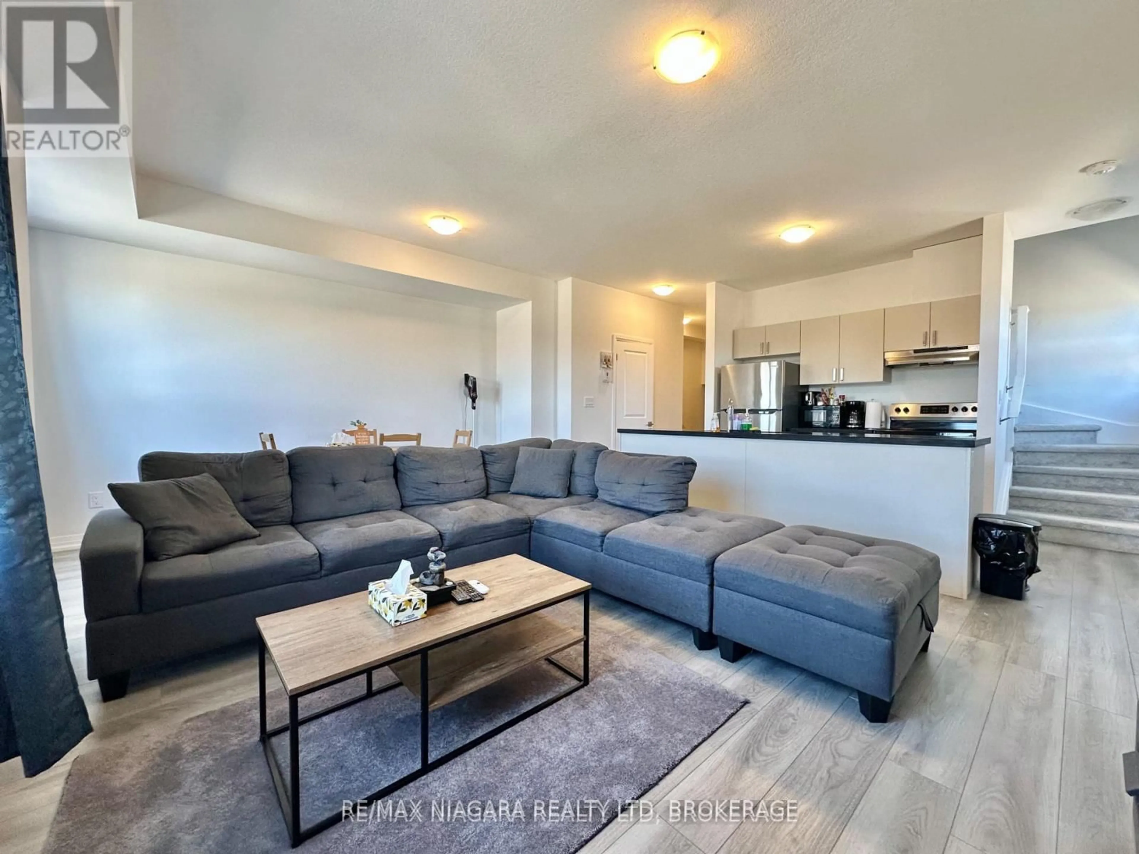 Living room with furniture, unknown for 6705 Cropp St #43, Niagara Falls Ontario L2E 0C1