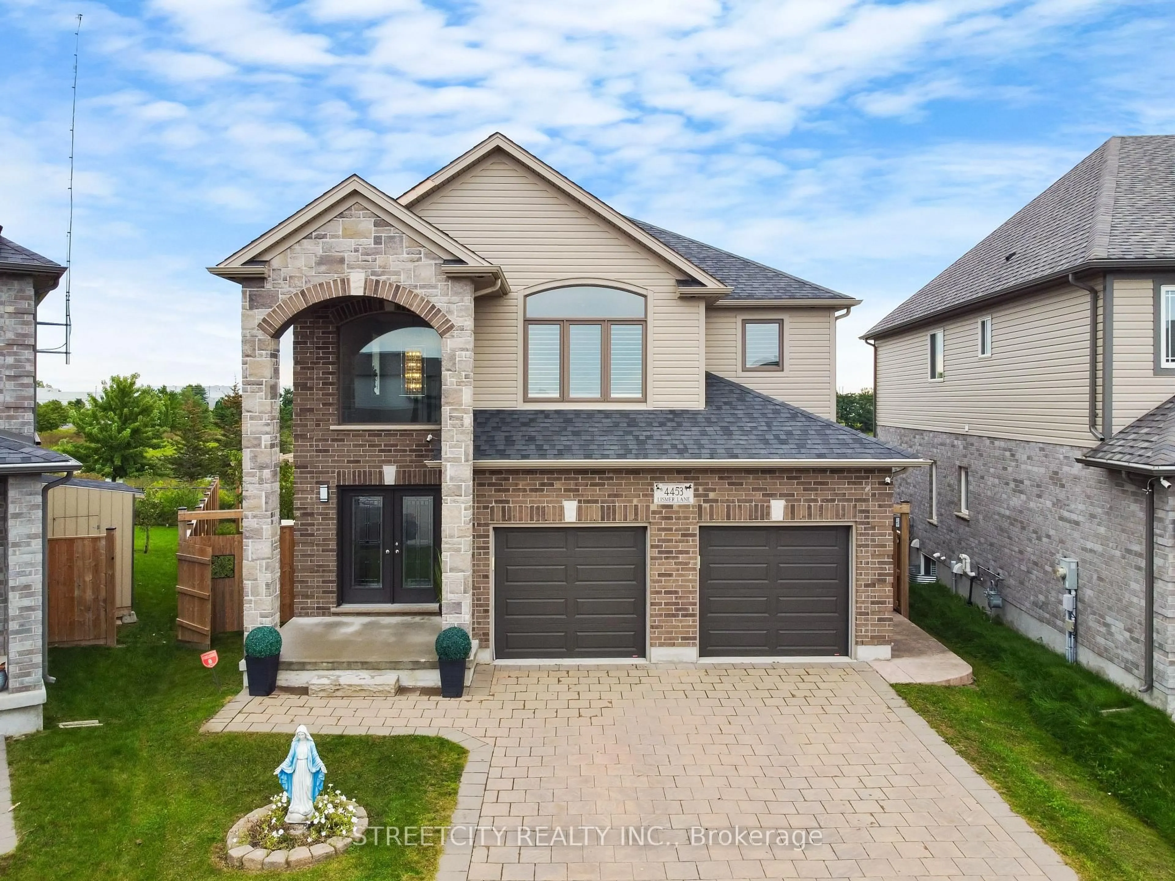 Home with brick exterior material, street for 4453 Lismer Lane, London South Ontario N6L 0E1