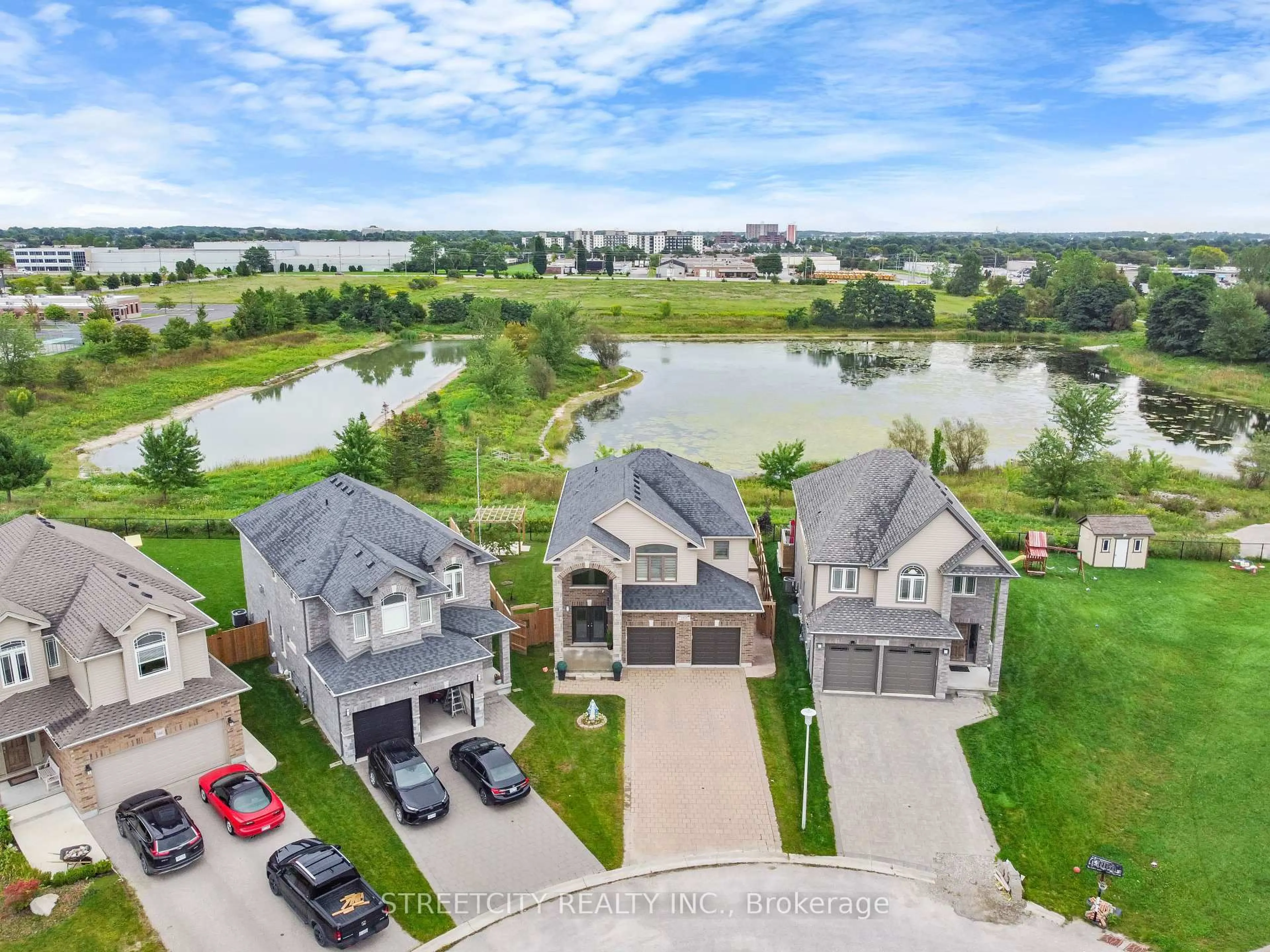 A pic from outside/outdoor area/front of a property/back of a property/a pic from drone, water/lake/river/ocean view for 4453 Lismer Lane, London South Ontario N6L 0E1