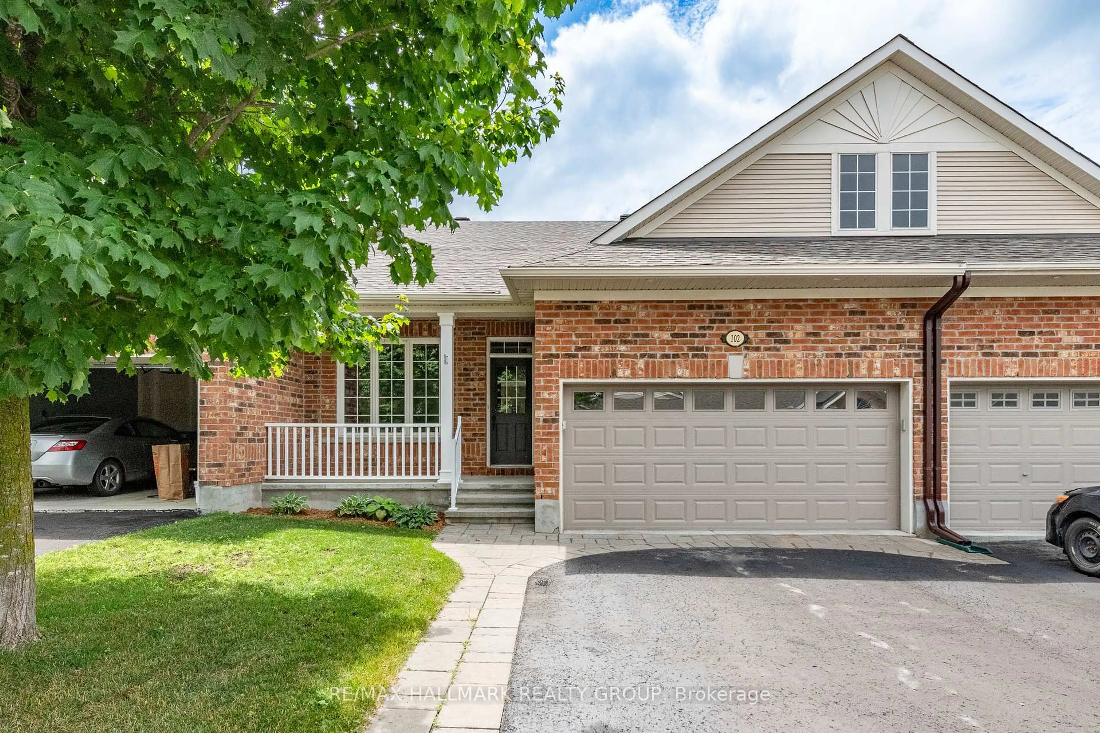 Home with brick exterior material, street for 102 Kelso Private, Ottawa Ontario K2J 0L9