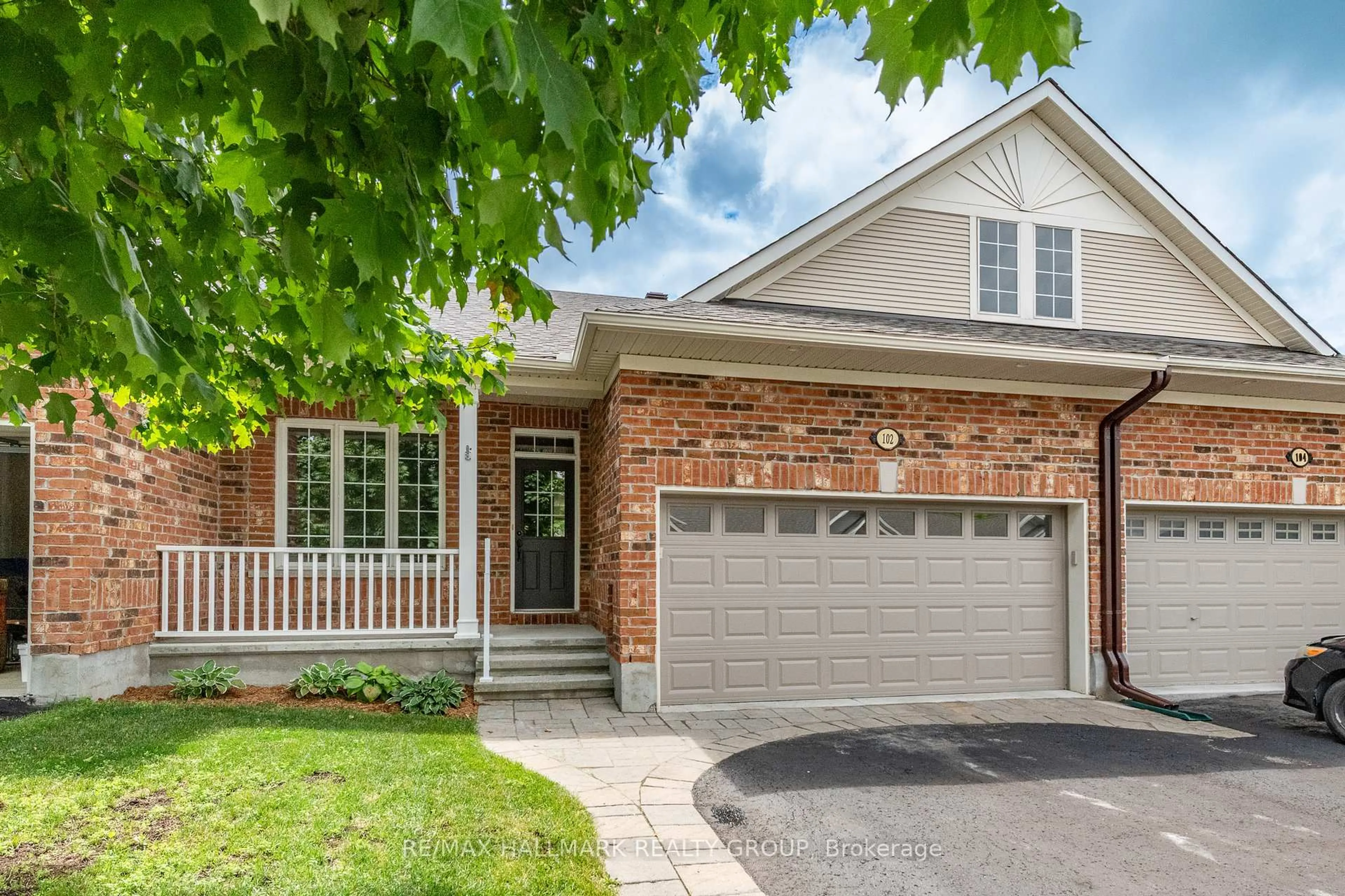 Home with brick exterior material, street for 102 Kelso Private, Ottawa Ontario K2J 0L9