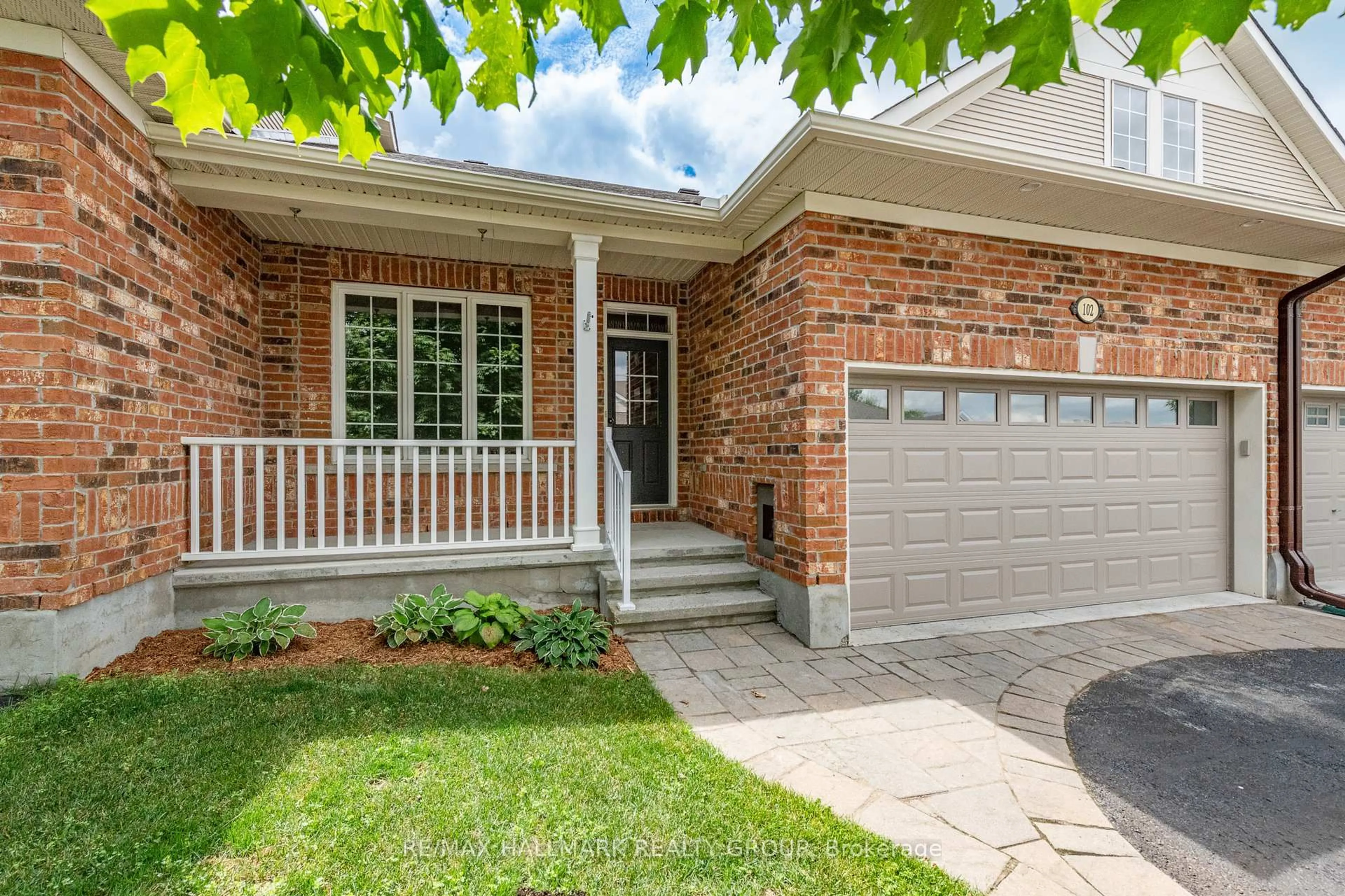 Home with brick exterior material, street for 102 Kelso Private, Ottawa Ontario K2J 0L9