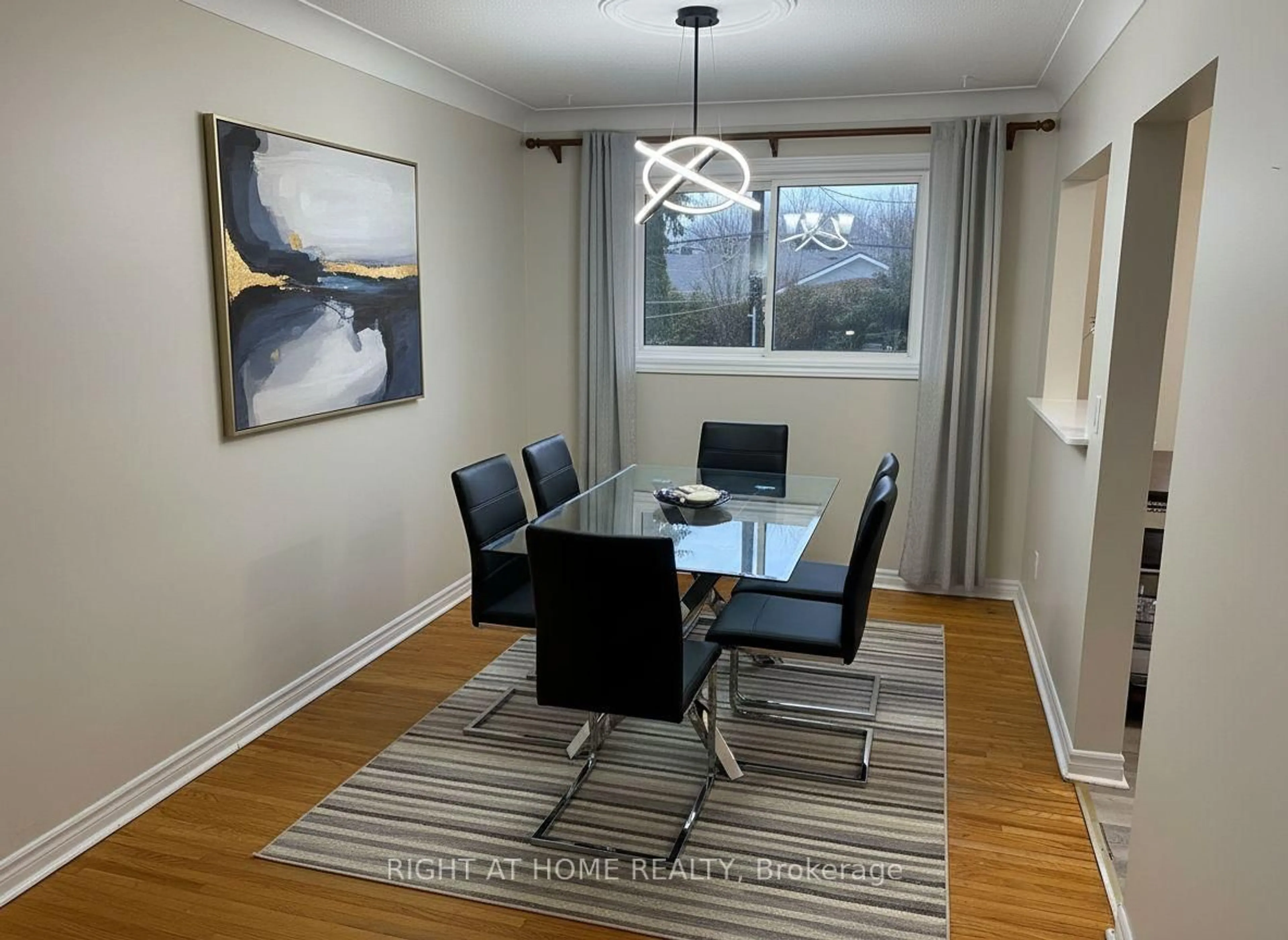 Dining room, wood/laminate floor for 82 Queen Mary Rd, Kingston Ontario K7M 2A5