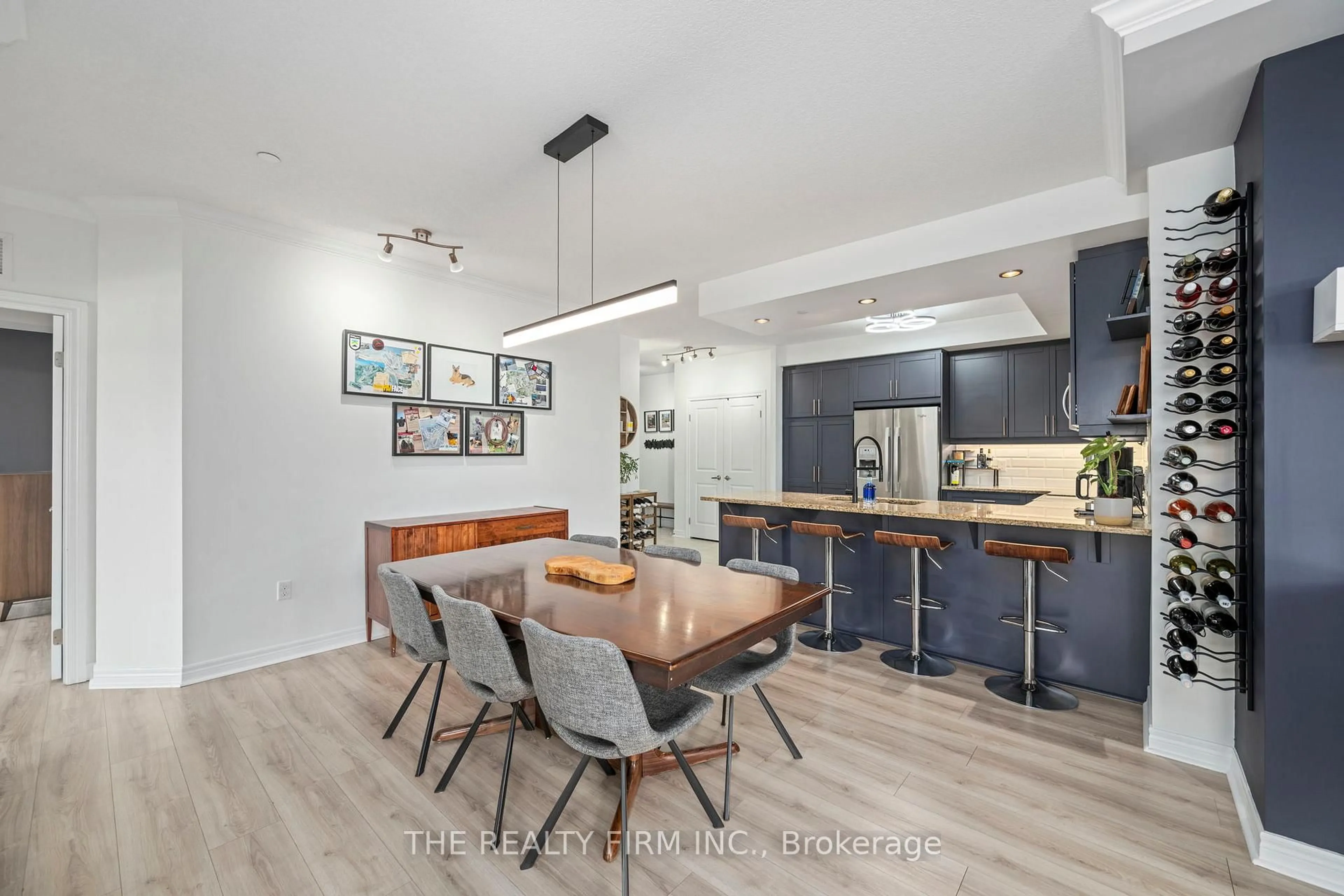 Open concept kitchen, wood/laminate floor for 330 Ridout St #803, London East Ontario N6A 0A7