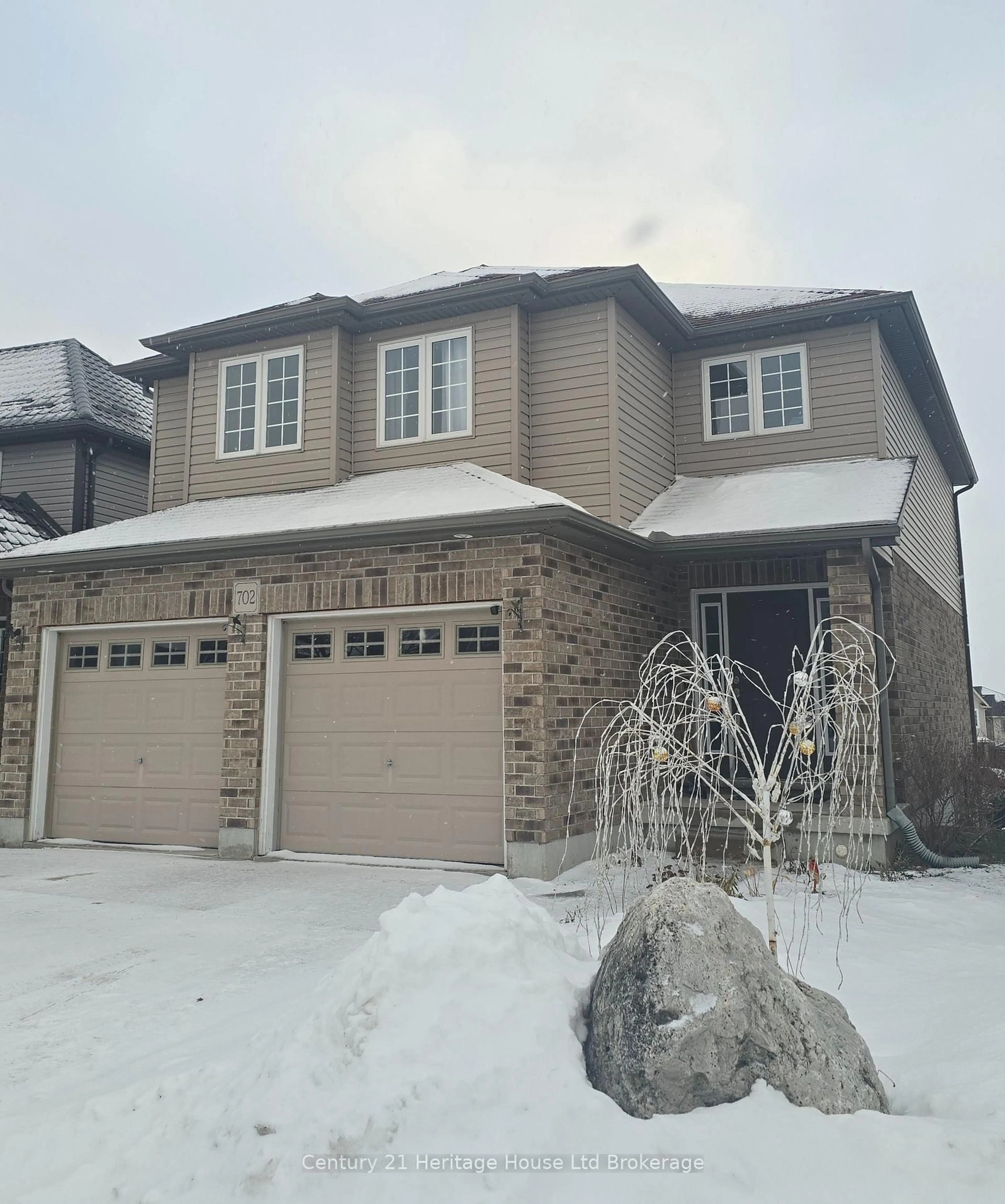 Home with brick exterior material, street for 702 Frontenac Cres, Woodstock Ontario N4V 0B1