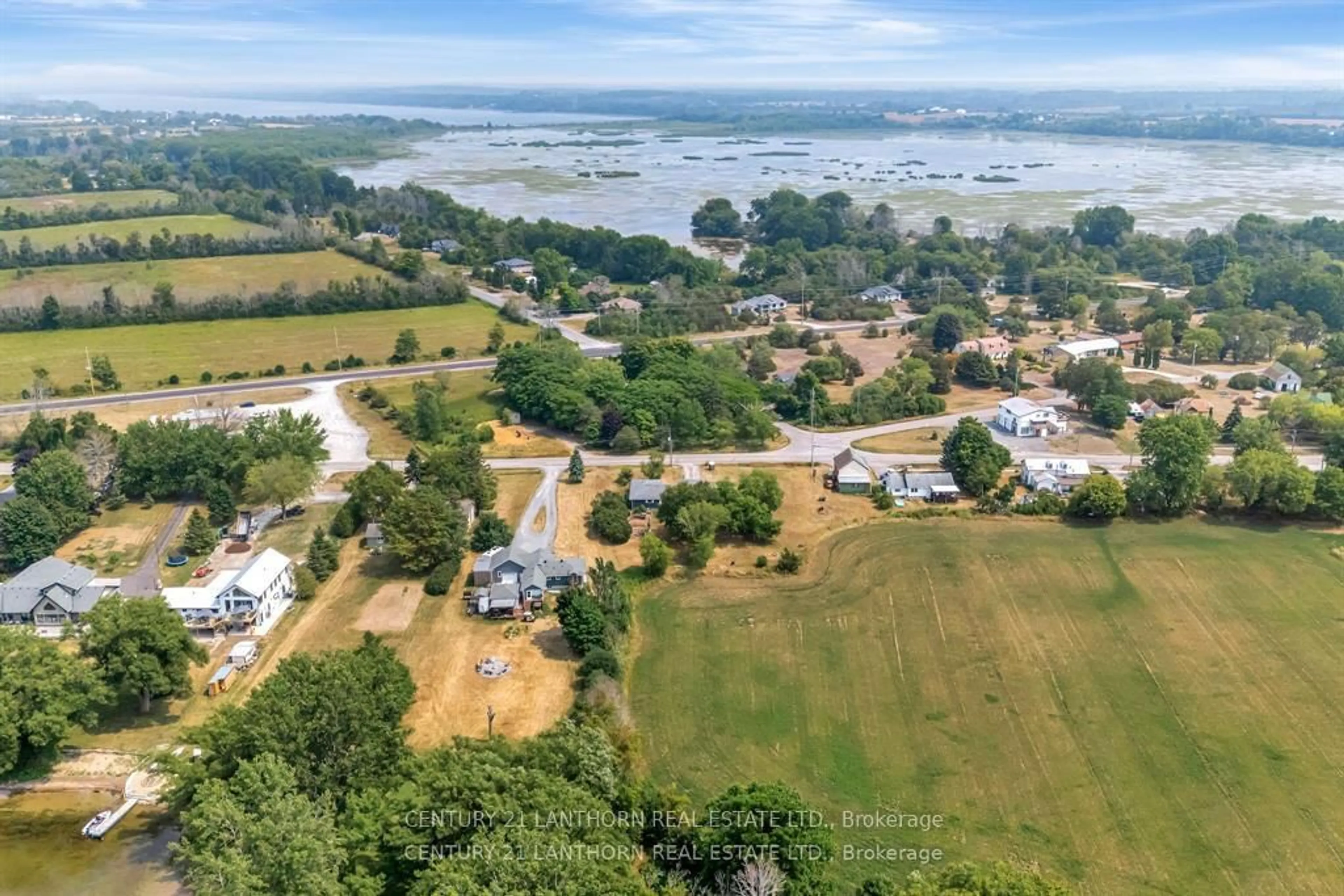A pic from outside/outdoor area/front of a property/back of a property/a pic from drone, water/lake/river/ocean view for 263 County Rd 29 Rd, Prince Edward County Ontario K0K 1T0