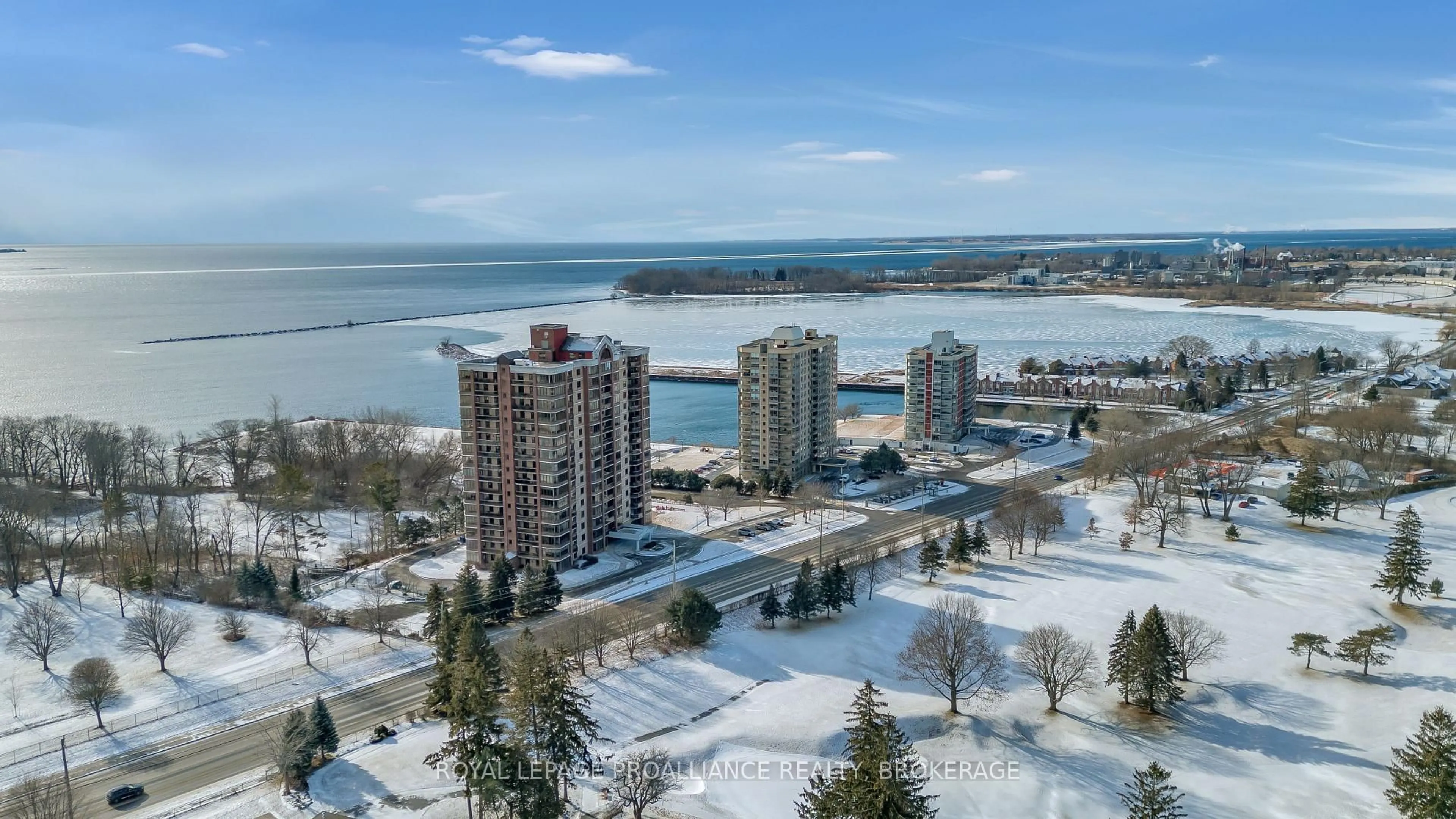 A pic from outside/outdoor area/front of a property/back of a property/a pic from drone, water/lake/river/ocean view for 1000 King St #705, Kingston Ontario K7M 8H3