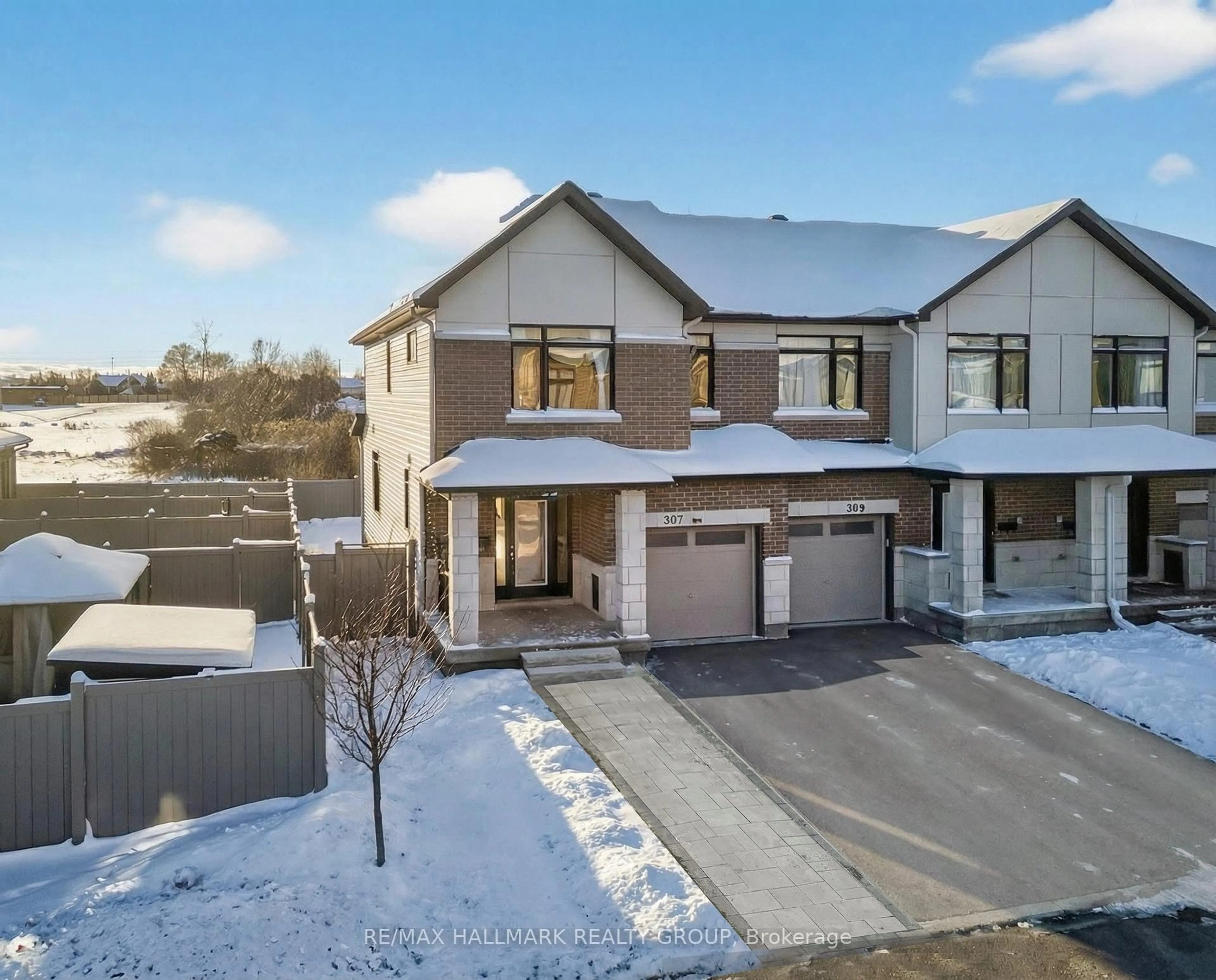 A pic from outside/outdoor area/front of a property/back of a property/a pic from drone, street for 307 Ibanez Walk, Ottawa Ontario K1T 0V8