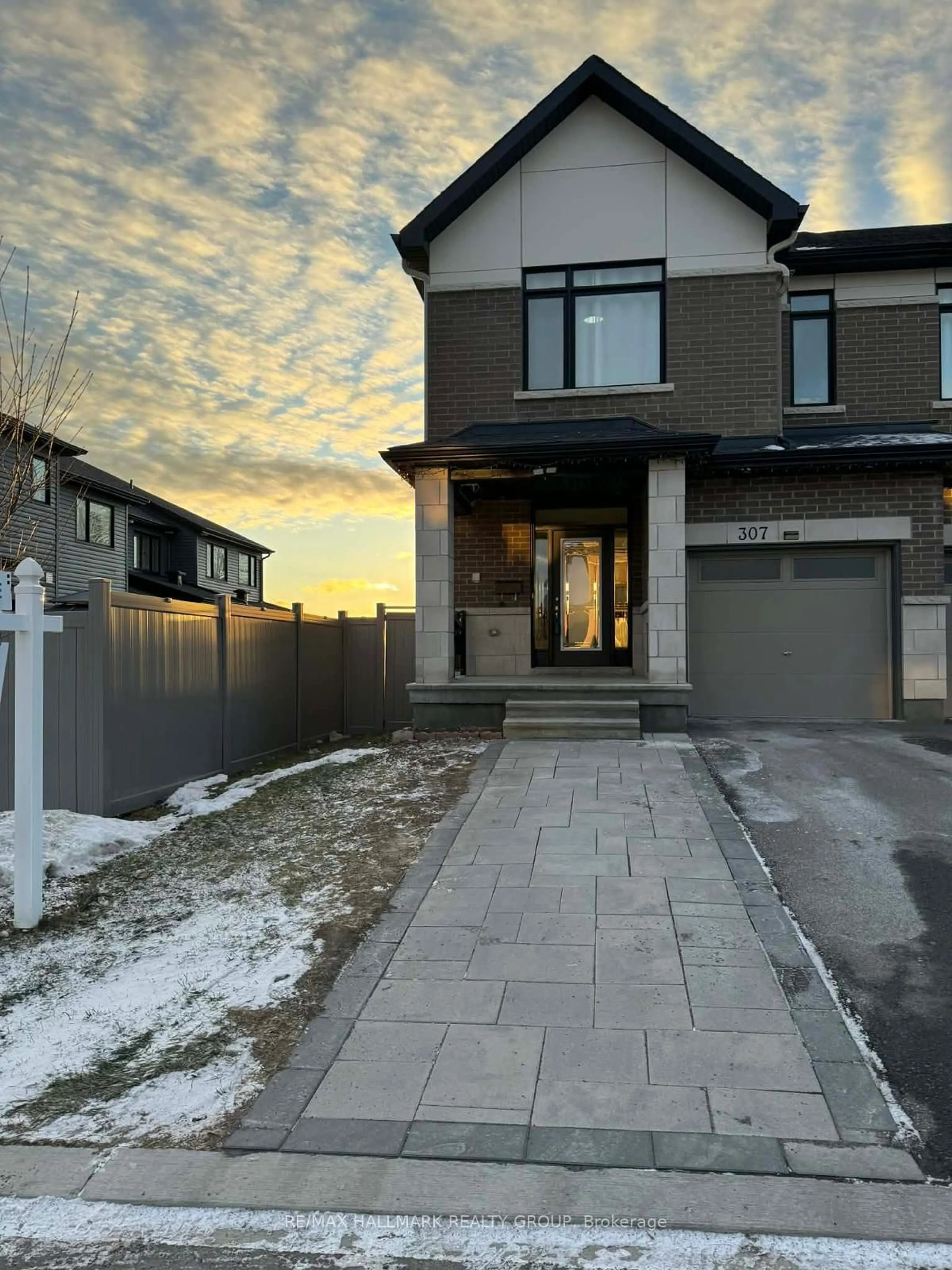 Home with brick exterior material, street for 307 Ibanez Walk, Ottawa Ontario K1T 0V8