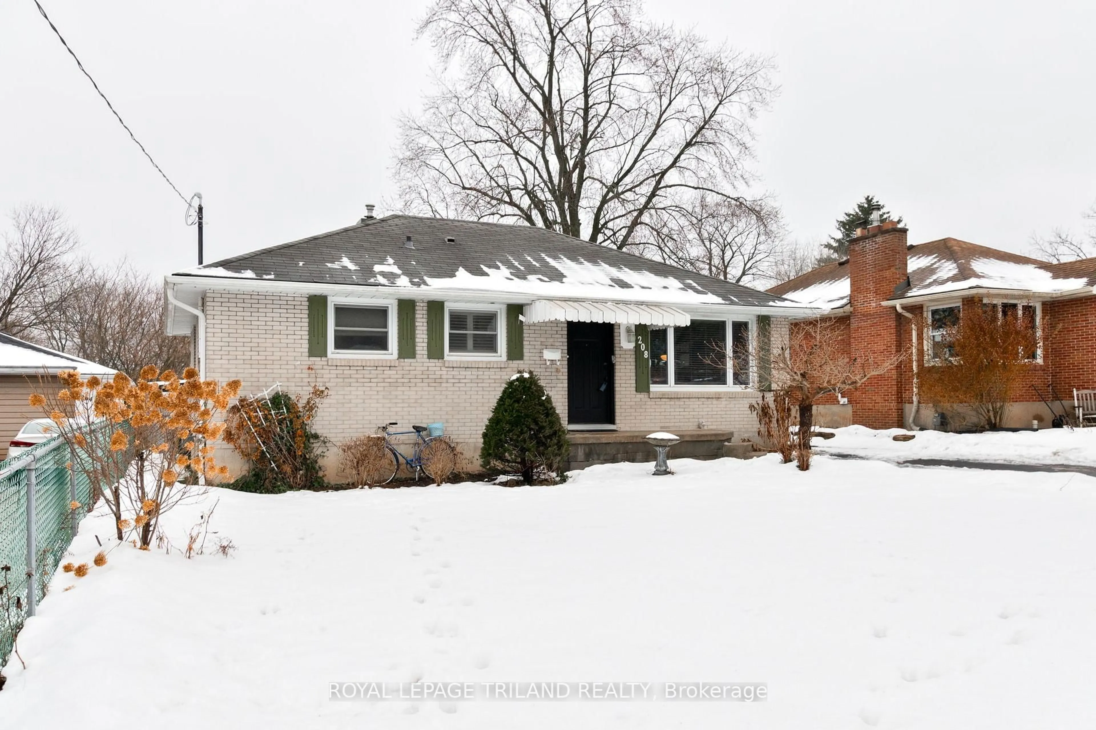 Home with brick exterior material, street for 208 Trowbridge Ave, London South Ontario N6J 3M3