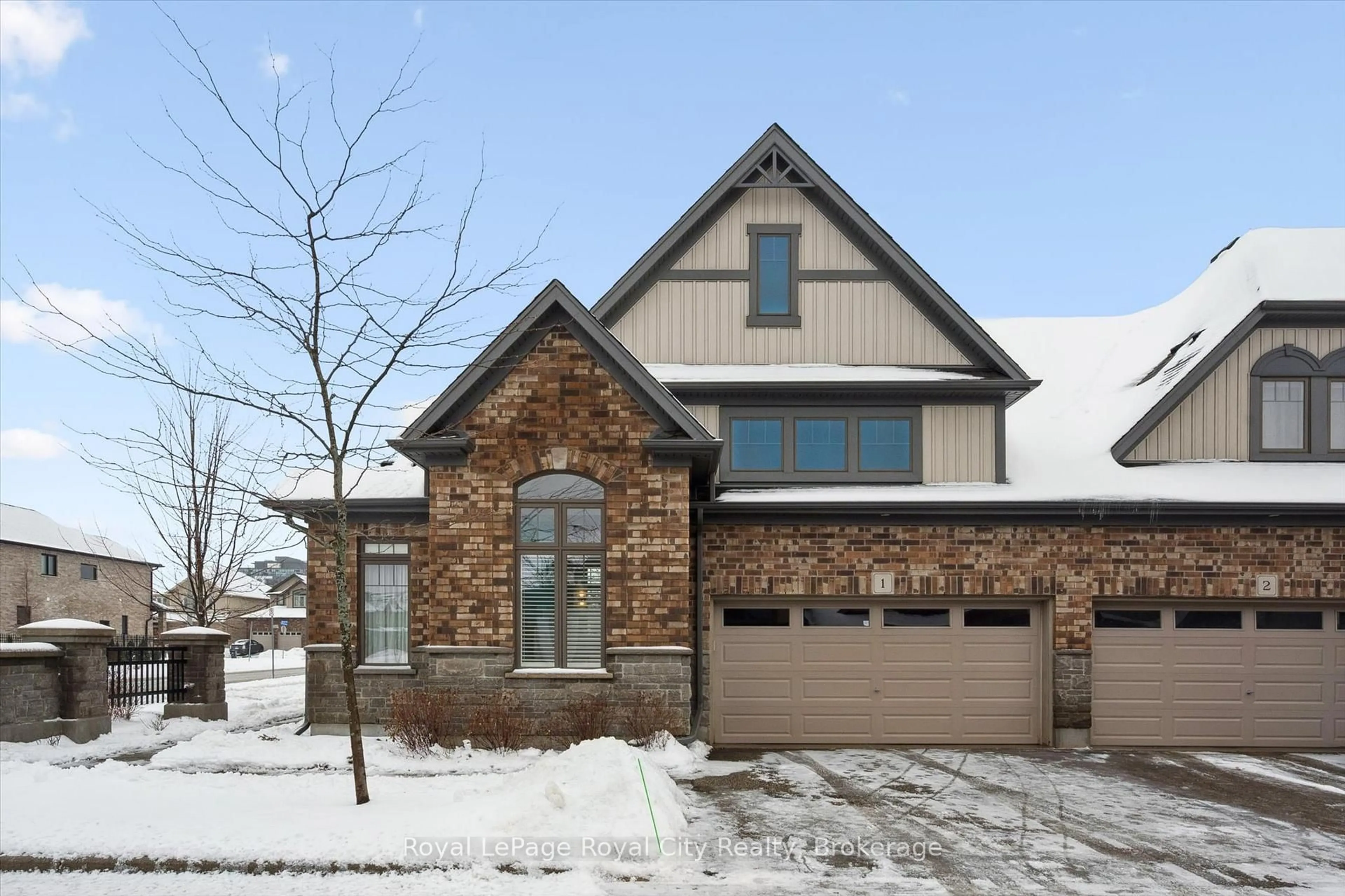 Home with brick exterior material, street for 39 Kay Cres #1, Guelph Ontario N1L 0N5